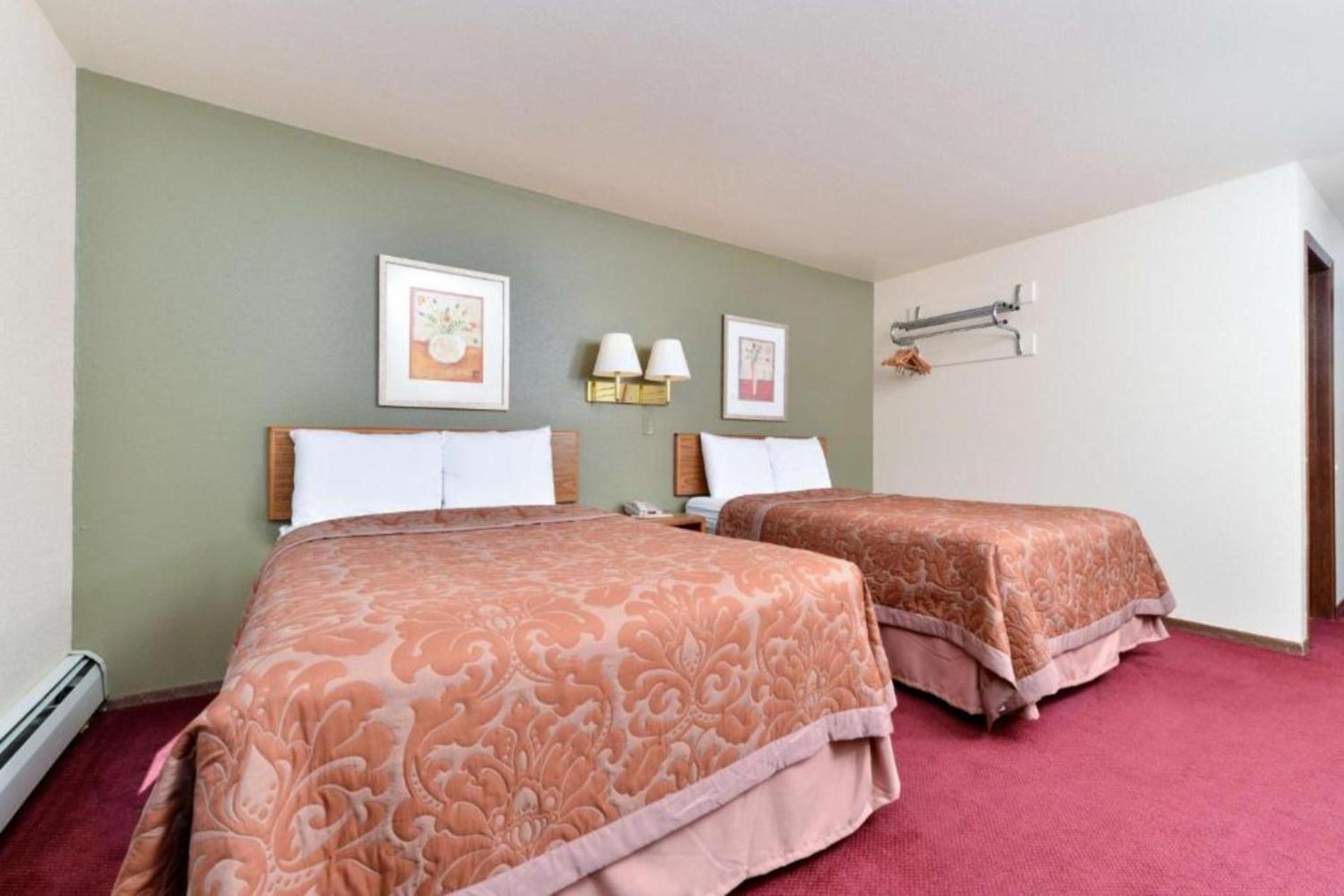 Quadruple Room with Two Double Beds and 4 Adults Occupancy (Non Smoking) photo 1