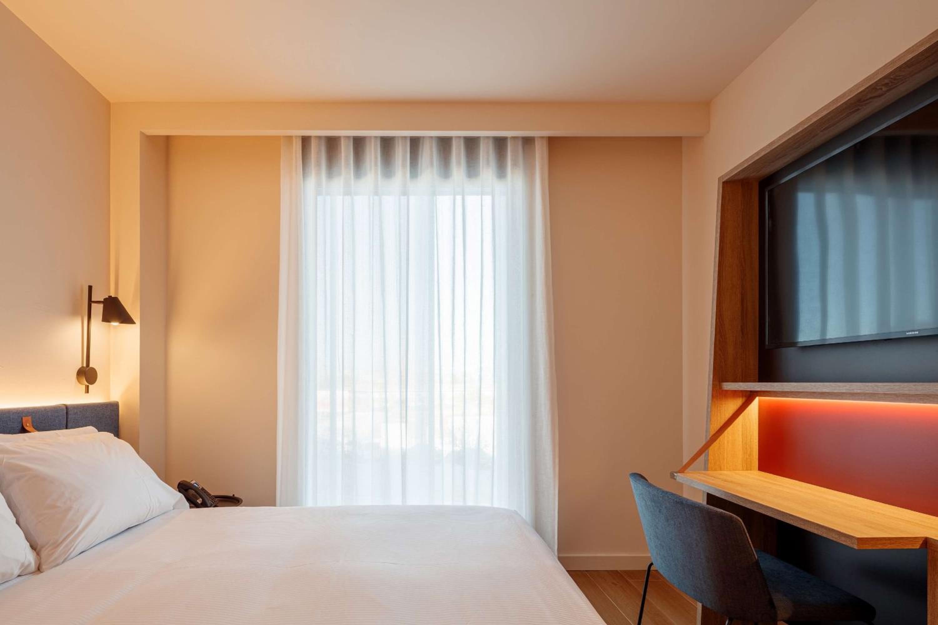 Habitación Queen con sofá cama