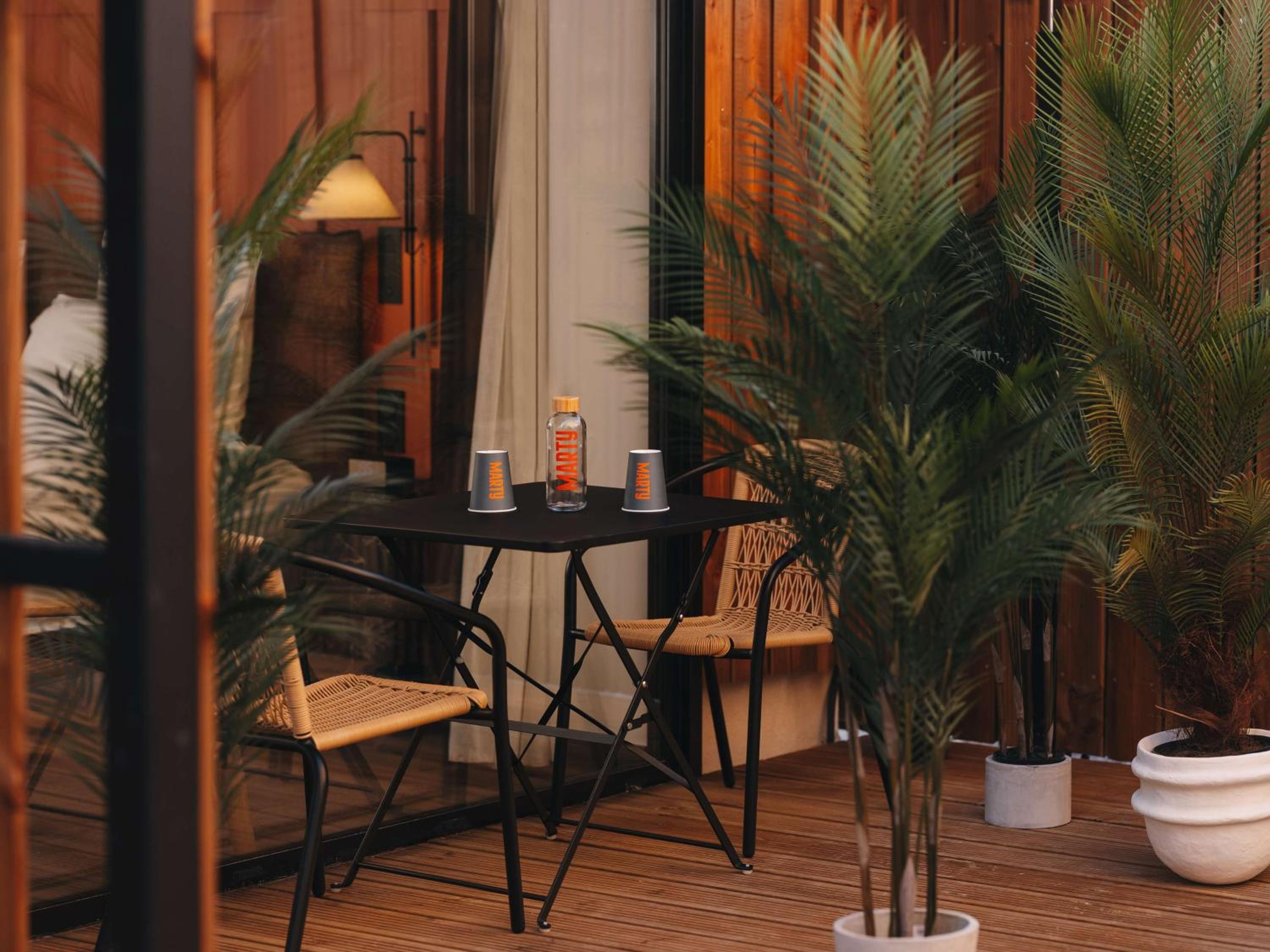 Deluxe King Room with Balcony - Photo 2