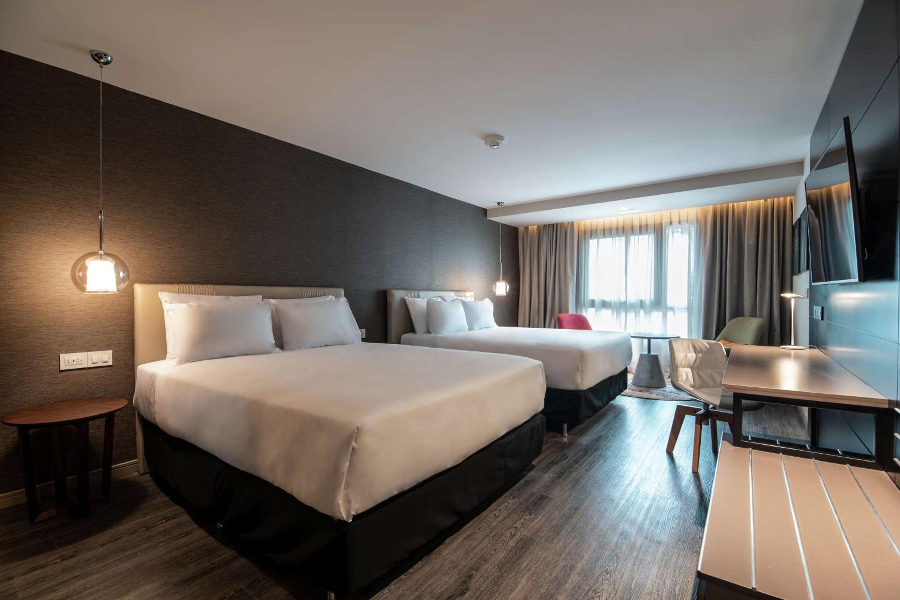 Deluxe Queen Room with Two Queen Beds and River View - Photo 1