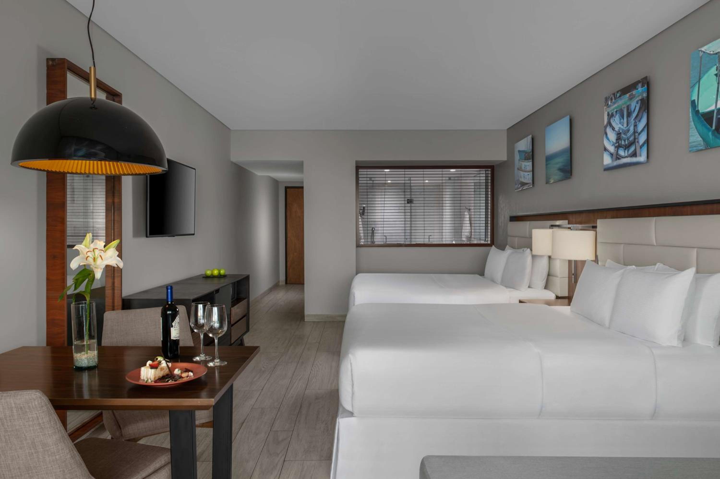 Queen Room with Two Queen Beds and Partial Ocean View