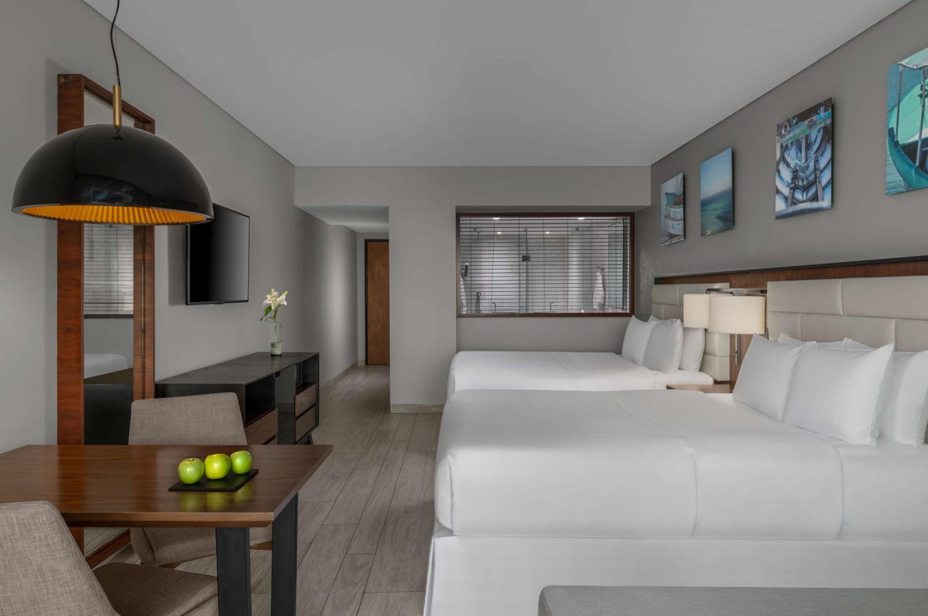 Queen Room with Two Queen Beds and Partial Ocean View