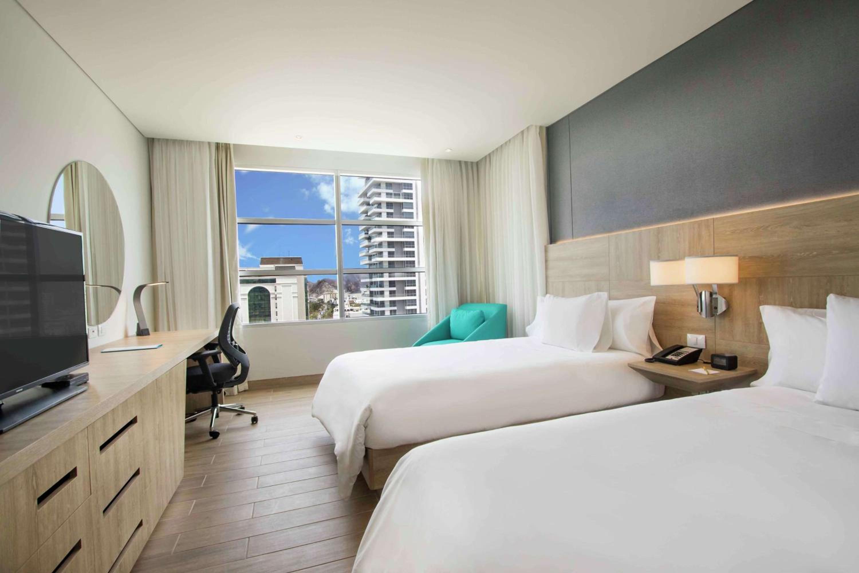 Double Room with Two Double Beds and Ocean View photo 1