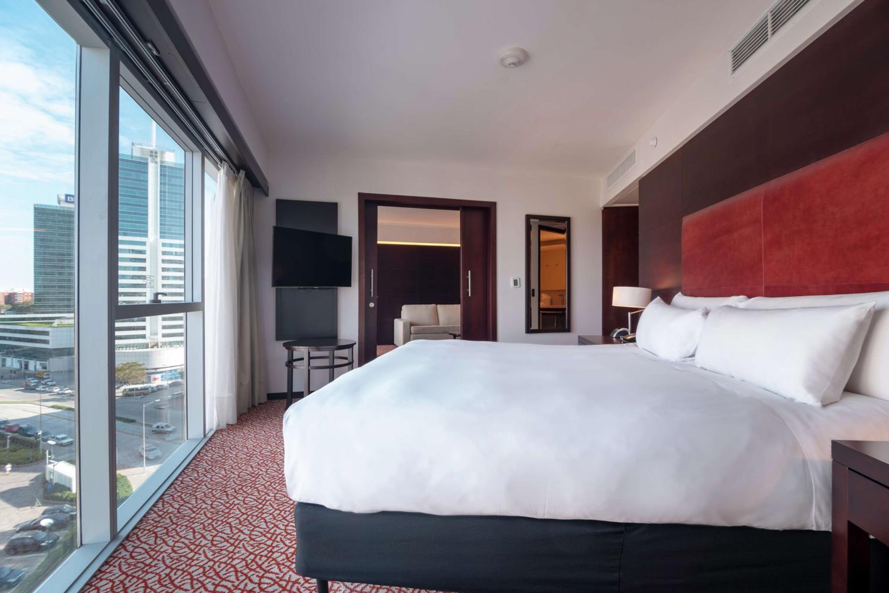 One-Bedroom King Suite with Sofa Bed photo 1