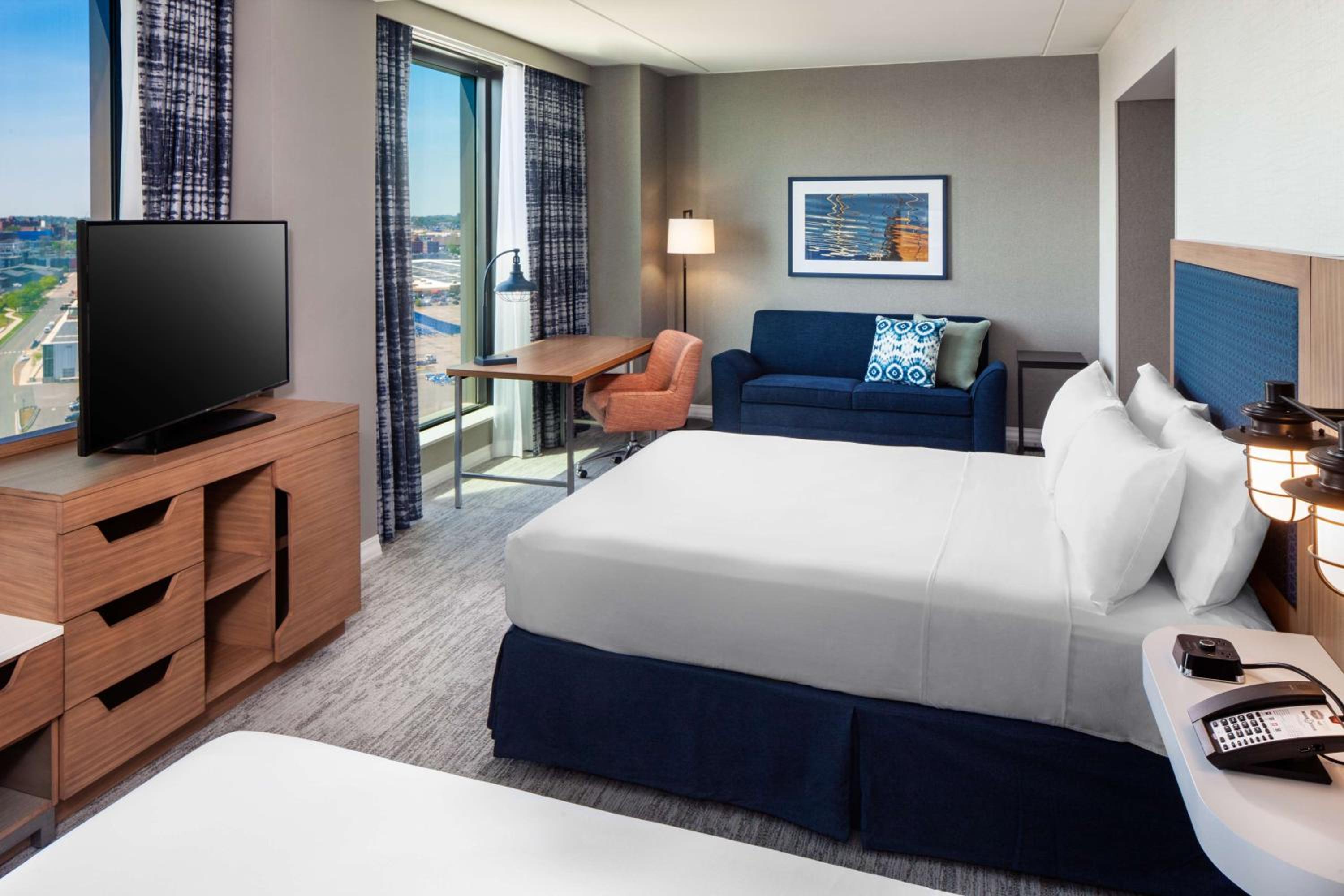 Queen Room with Two Queen Beds with Sofa Bed and Water View - Mobility Accessible