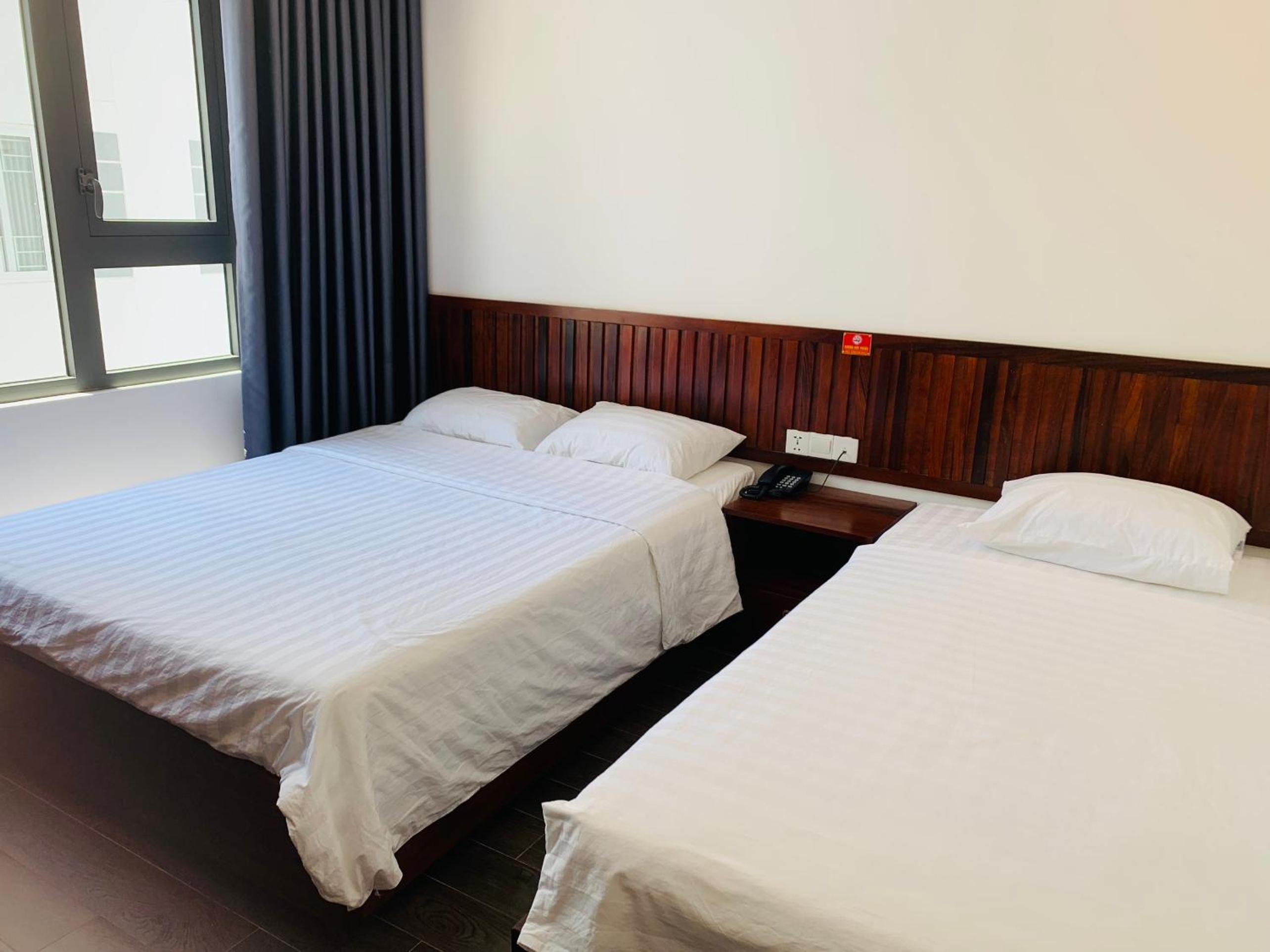 Deluxe Triple Room - Photo 2