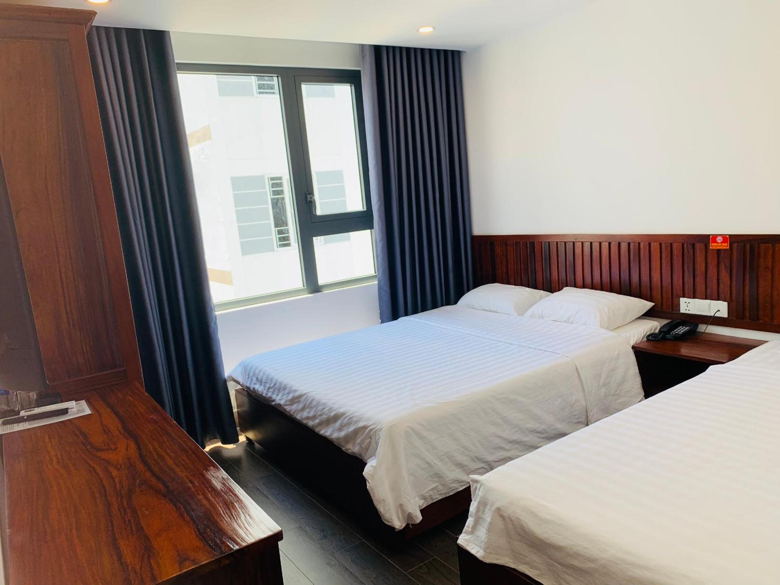 Deluxe Triple Room - Photo 3