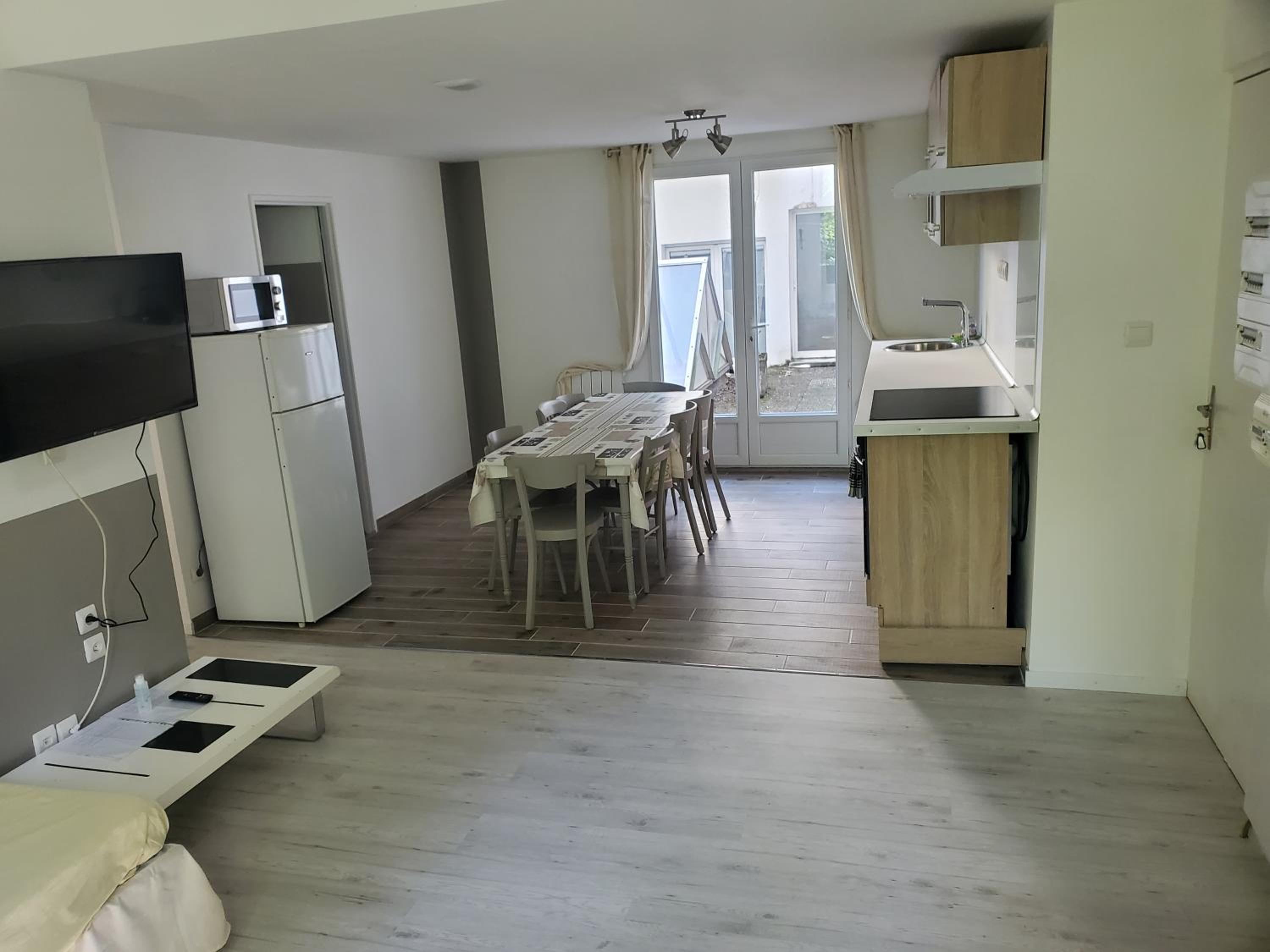 Three-Bedroom Apartment - Photo 12