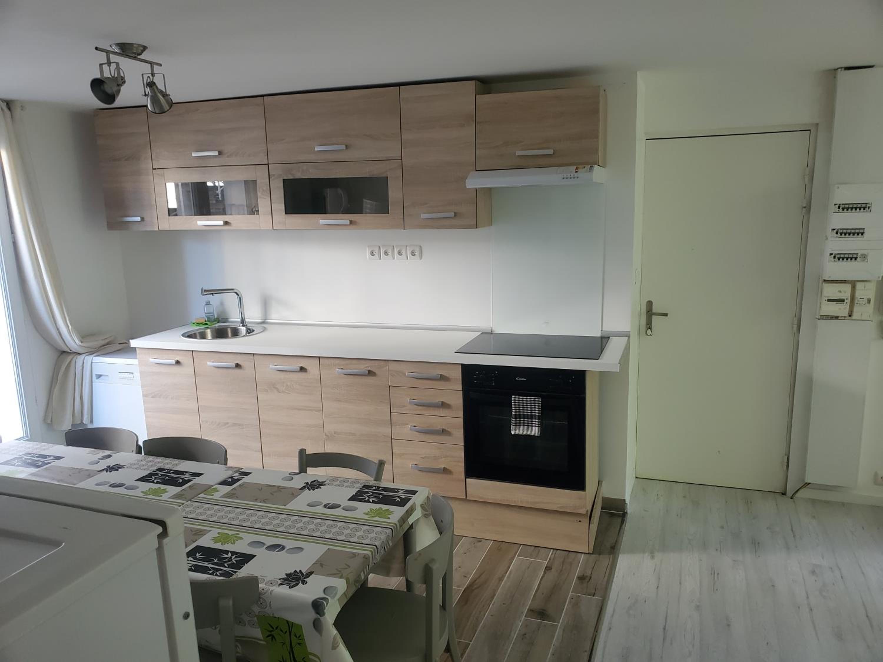 Three-Bedroom Apartment - Photo 11