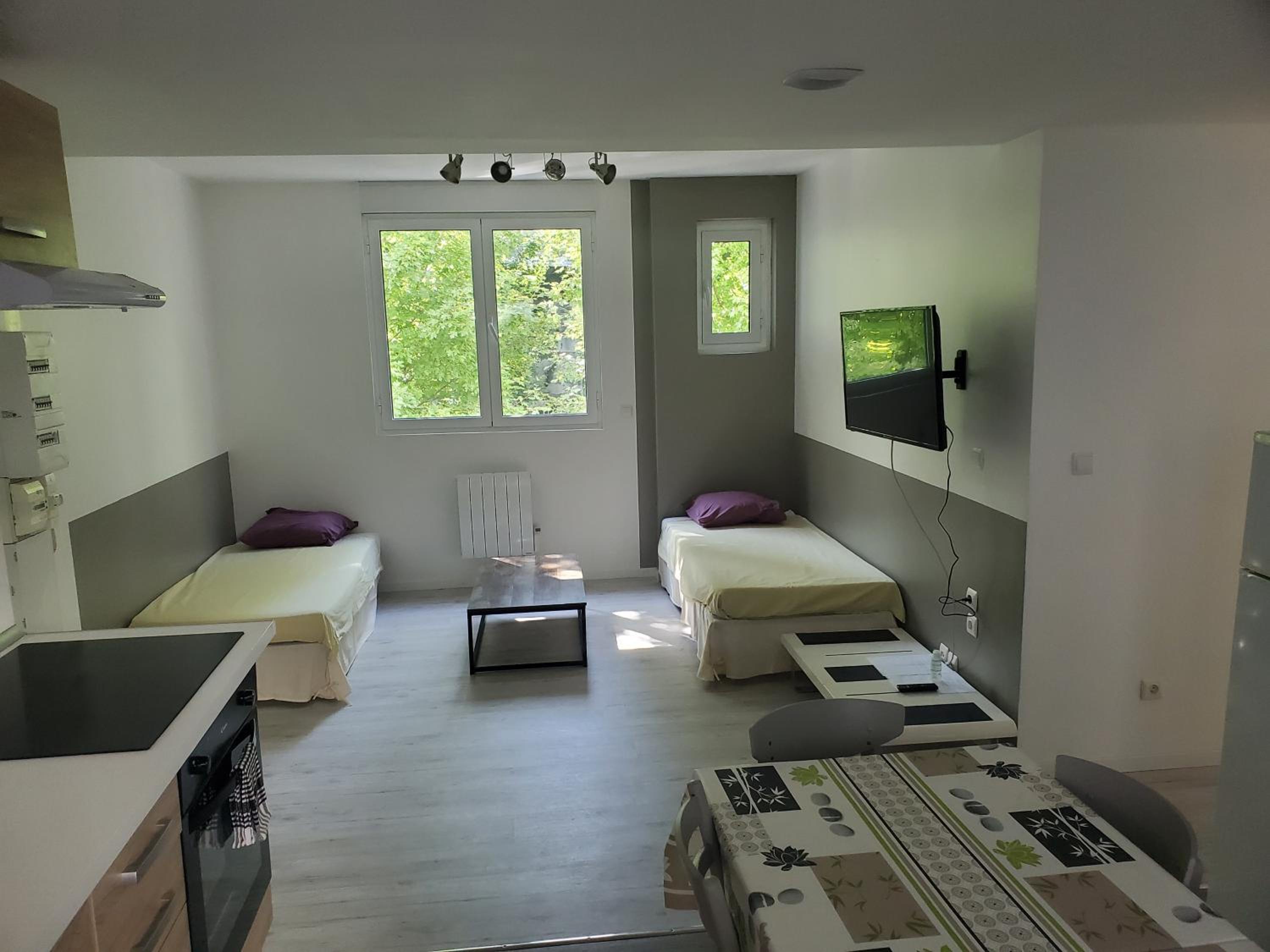 Three-Bedroom Apartment - Photo 1