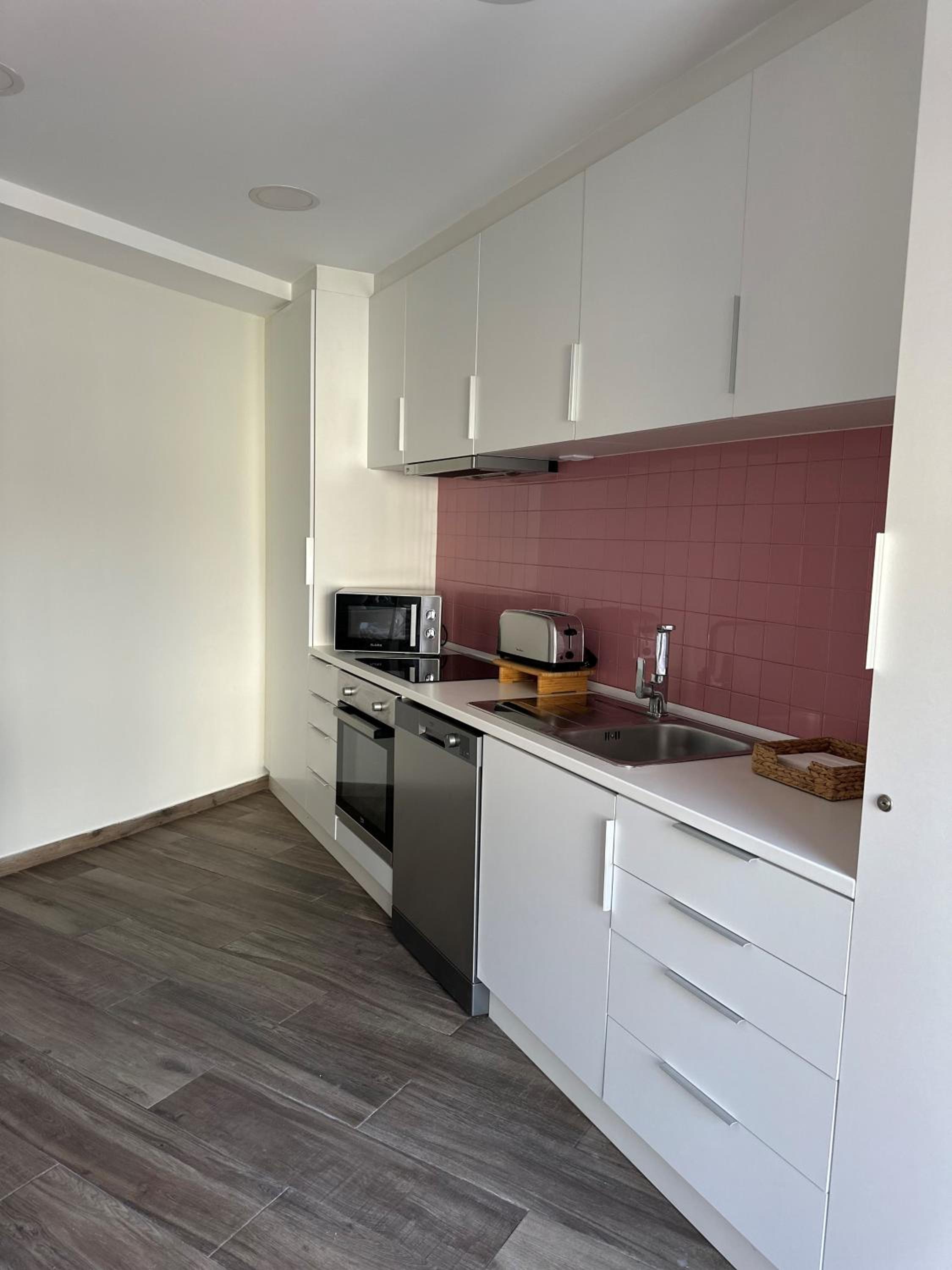 Three-Bedroom Apartment - Photo 11
