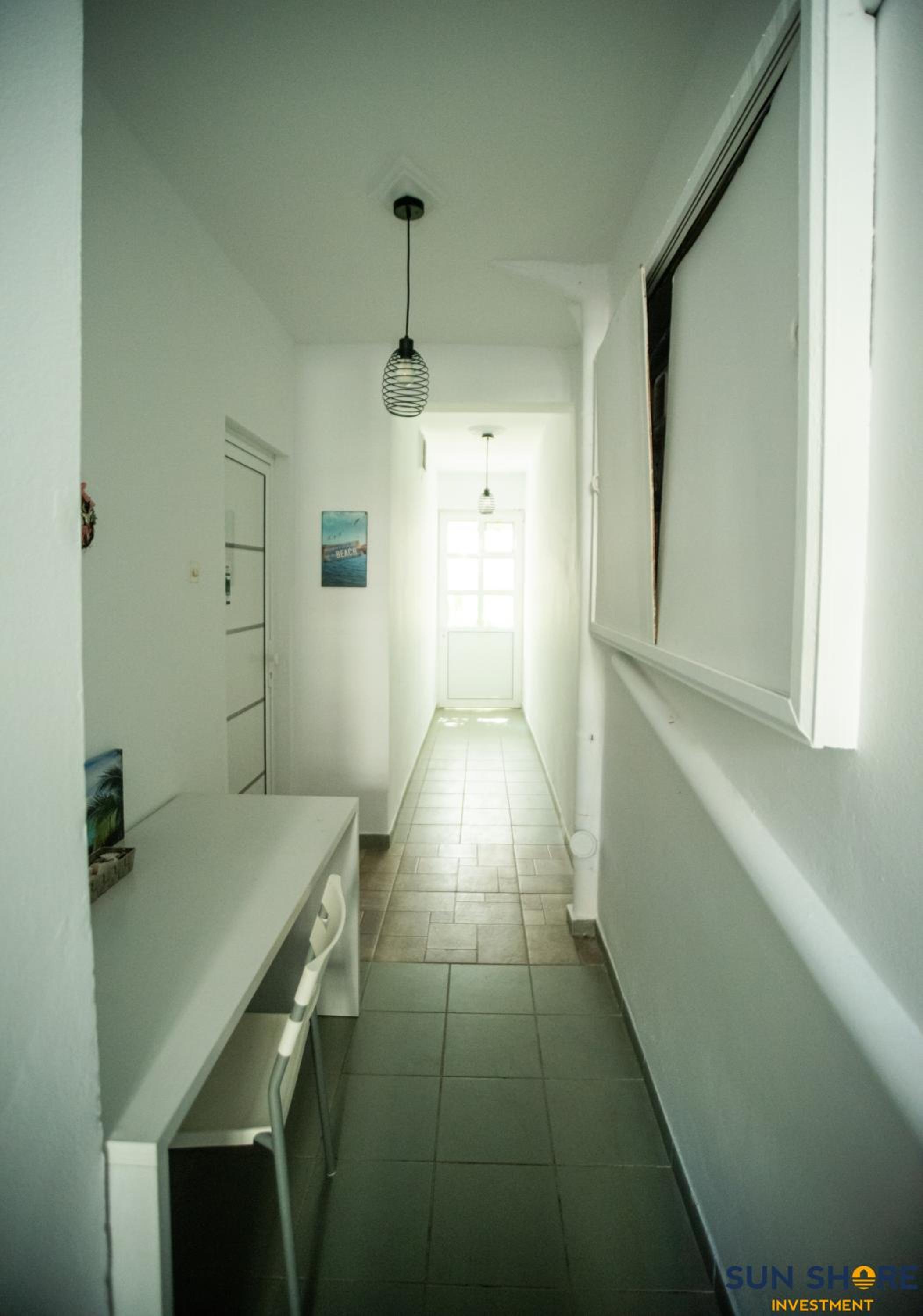 Two-Bedroom Apartment - Photo 11
