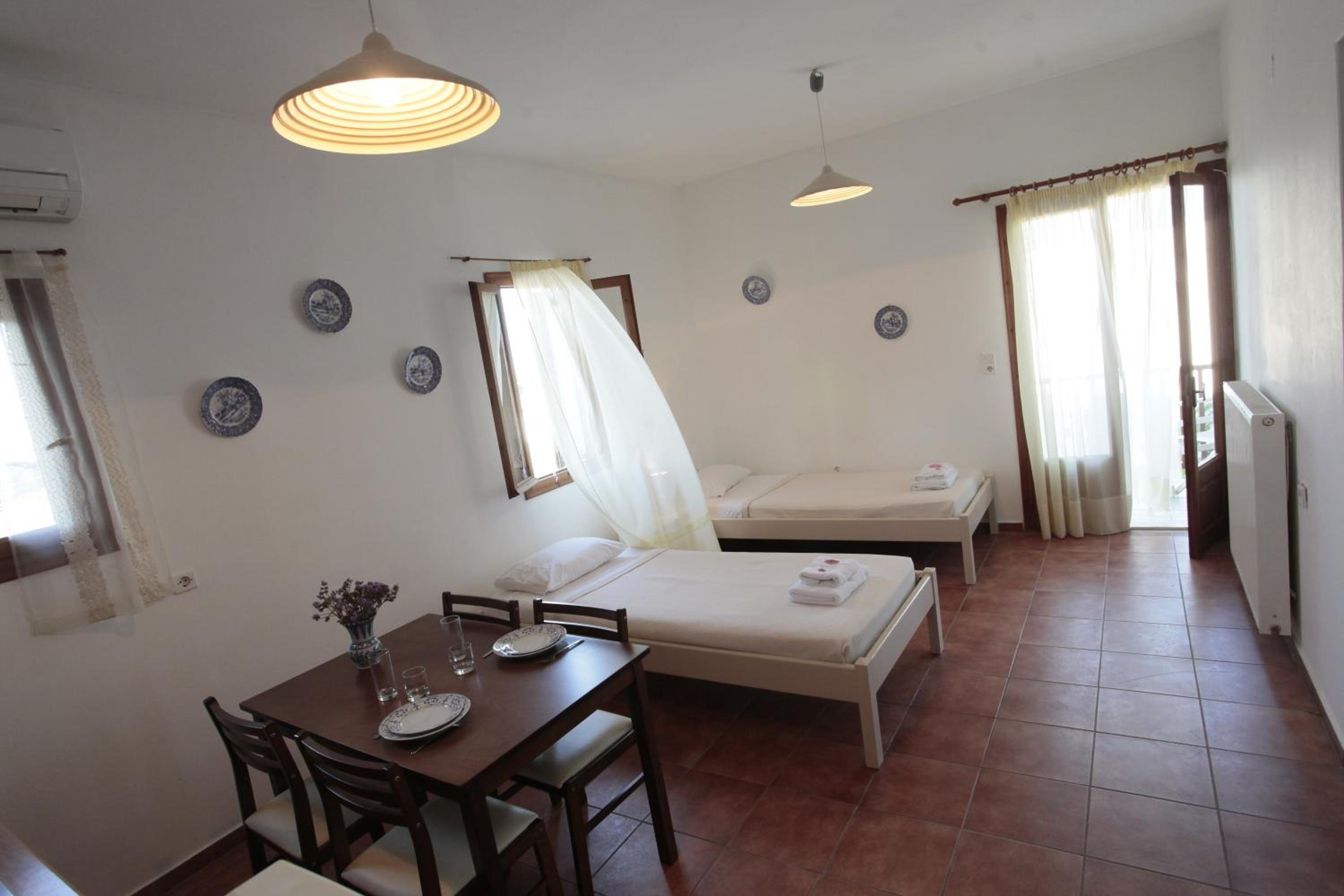 Quadruple Room with Balcony photo 2