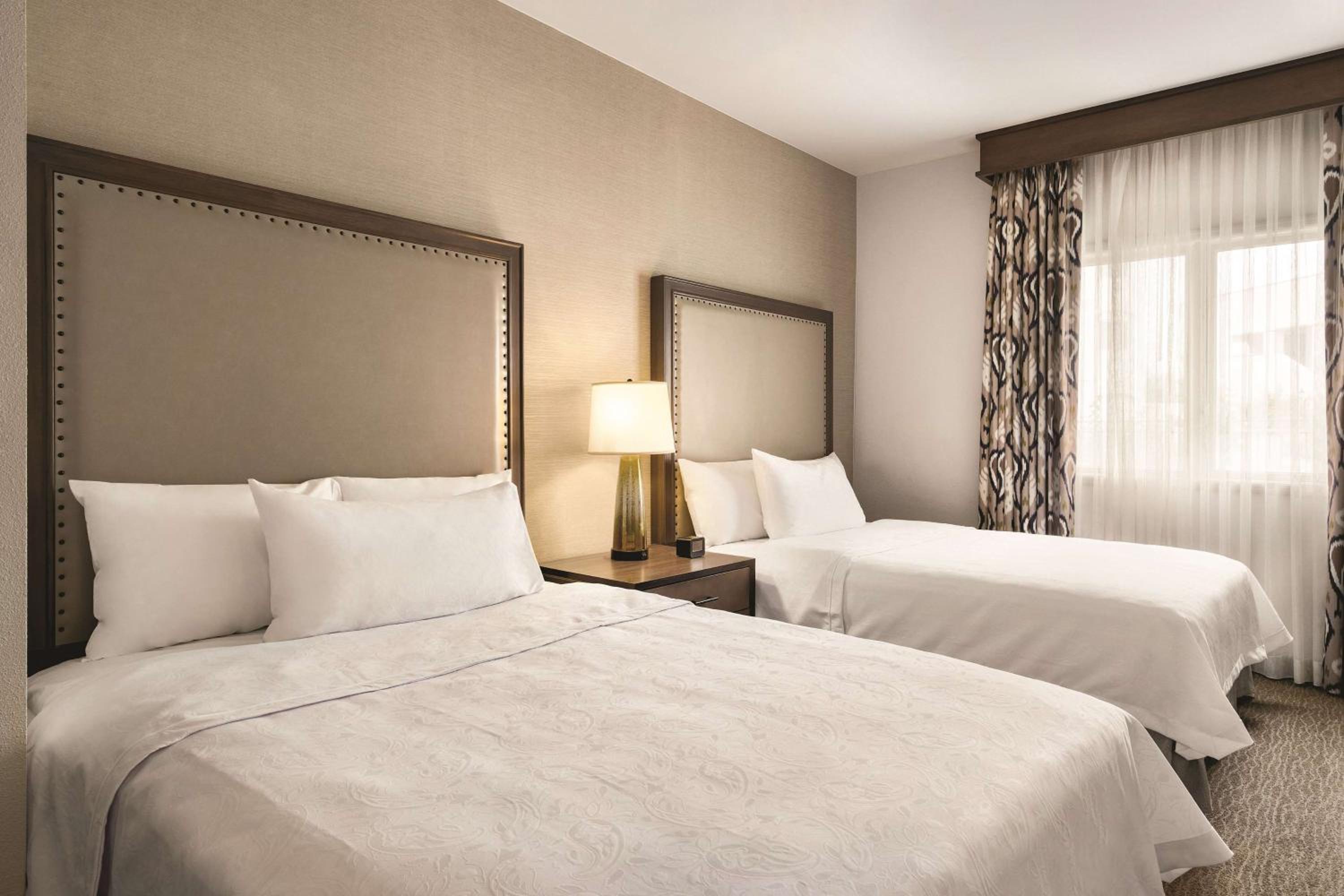 One-Bedroom Pool View Suite with 2 Queen Beds