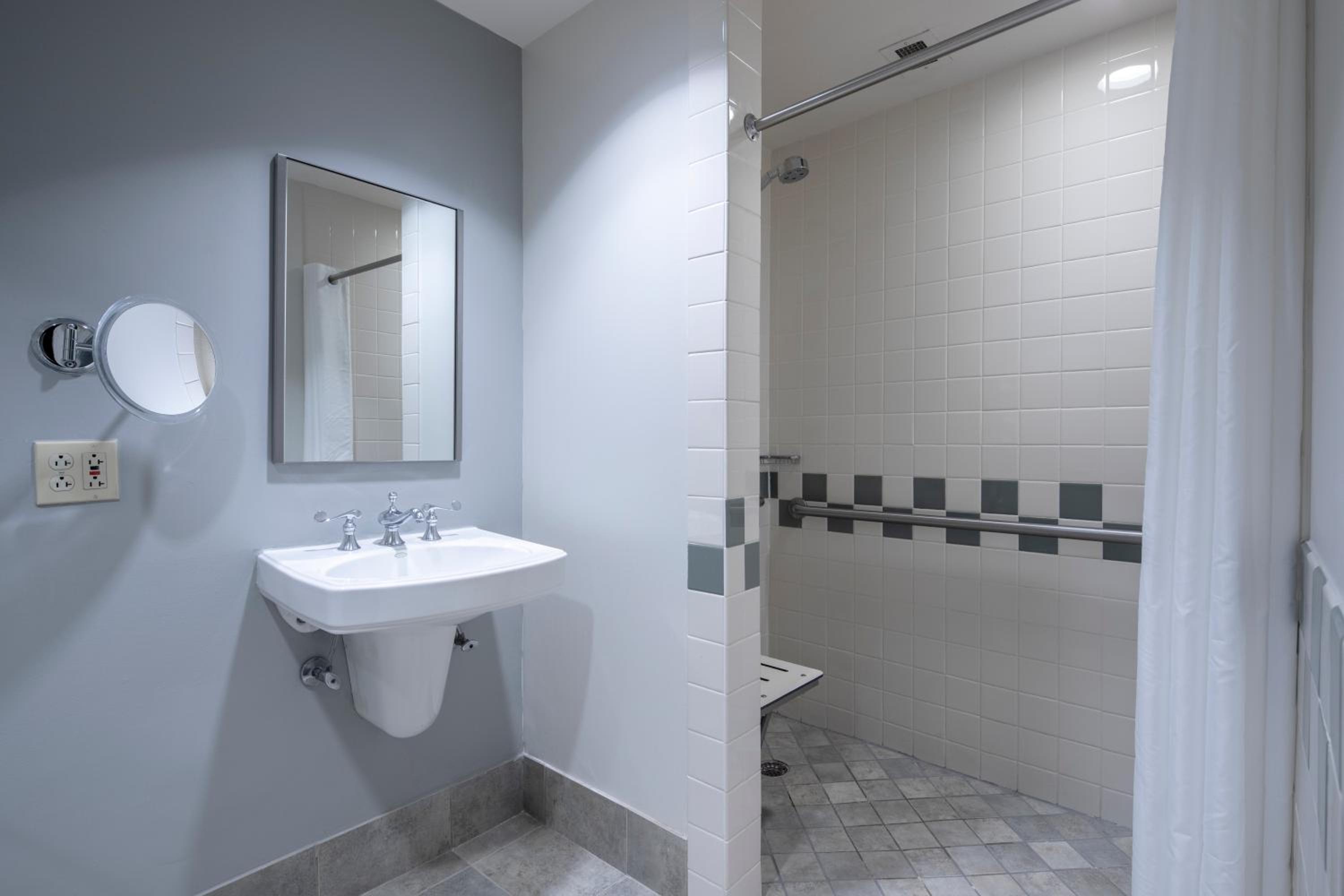 Mobility Accessible Garden View 2 Queen Room, w/roll-in shower (Includes FREE^ Universal Express Unlimited)