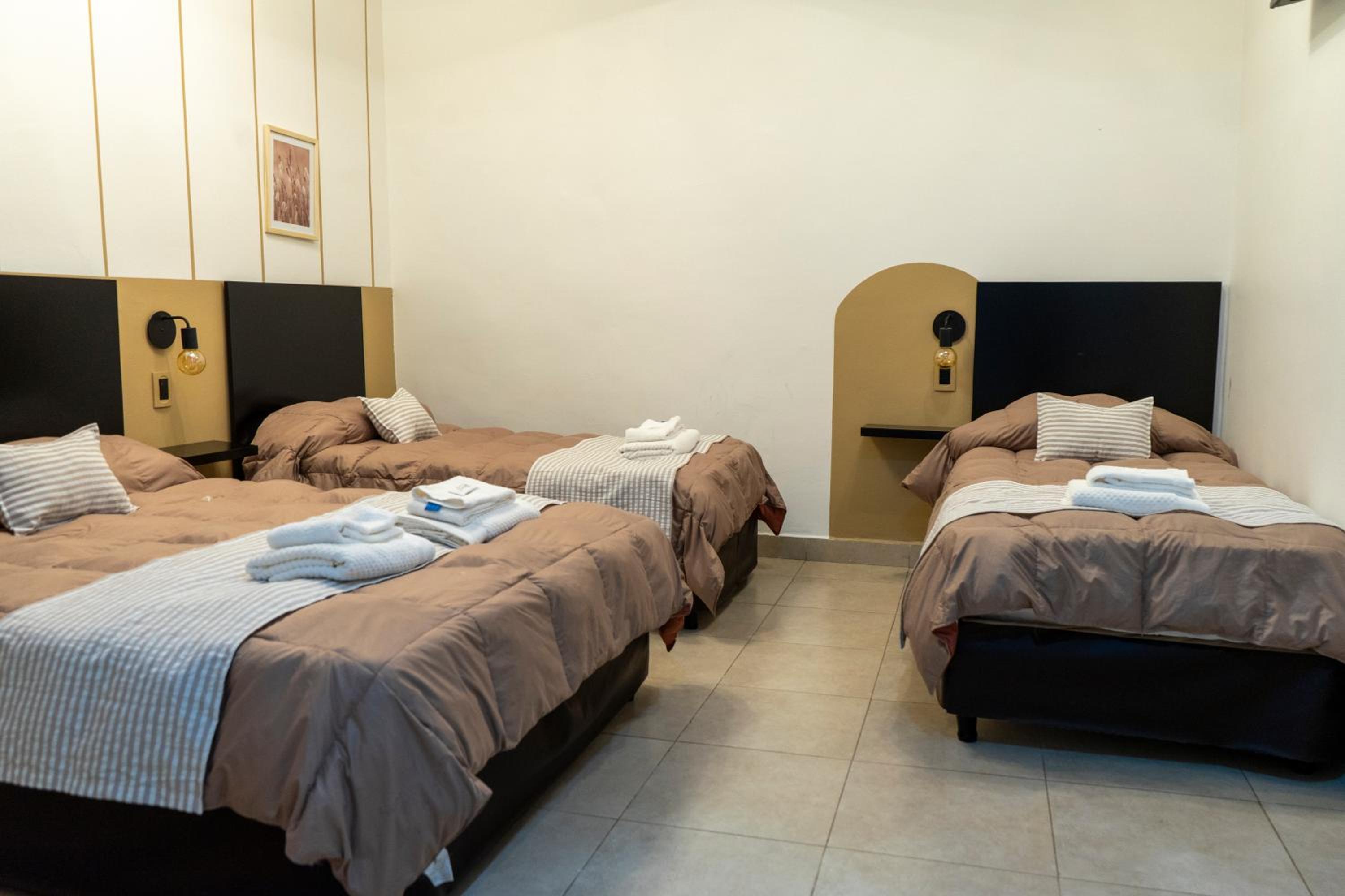 Quadruple Room with Private Bathroom photo 3