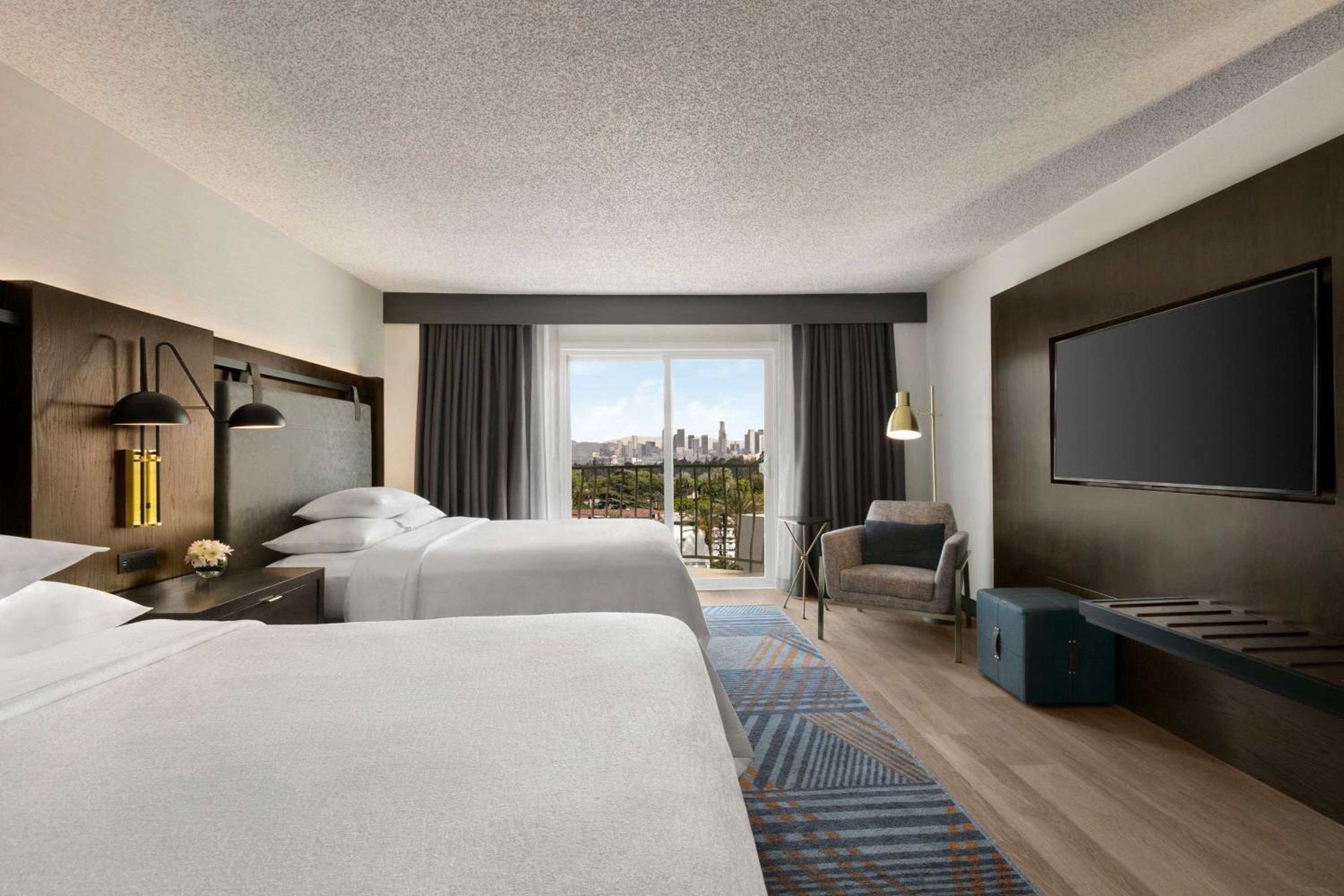 Queen Room with Two Queen Beds and Balcony - Photo 2