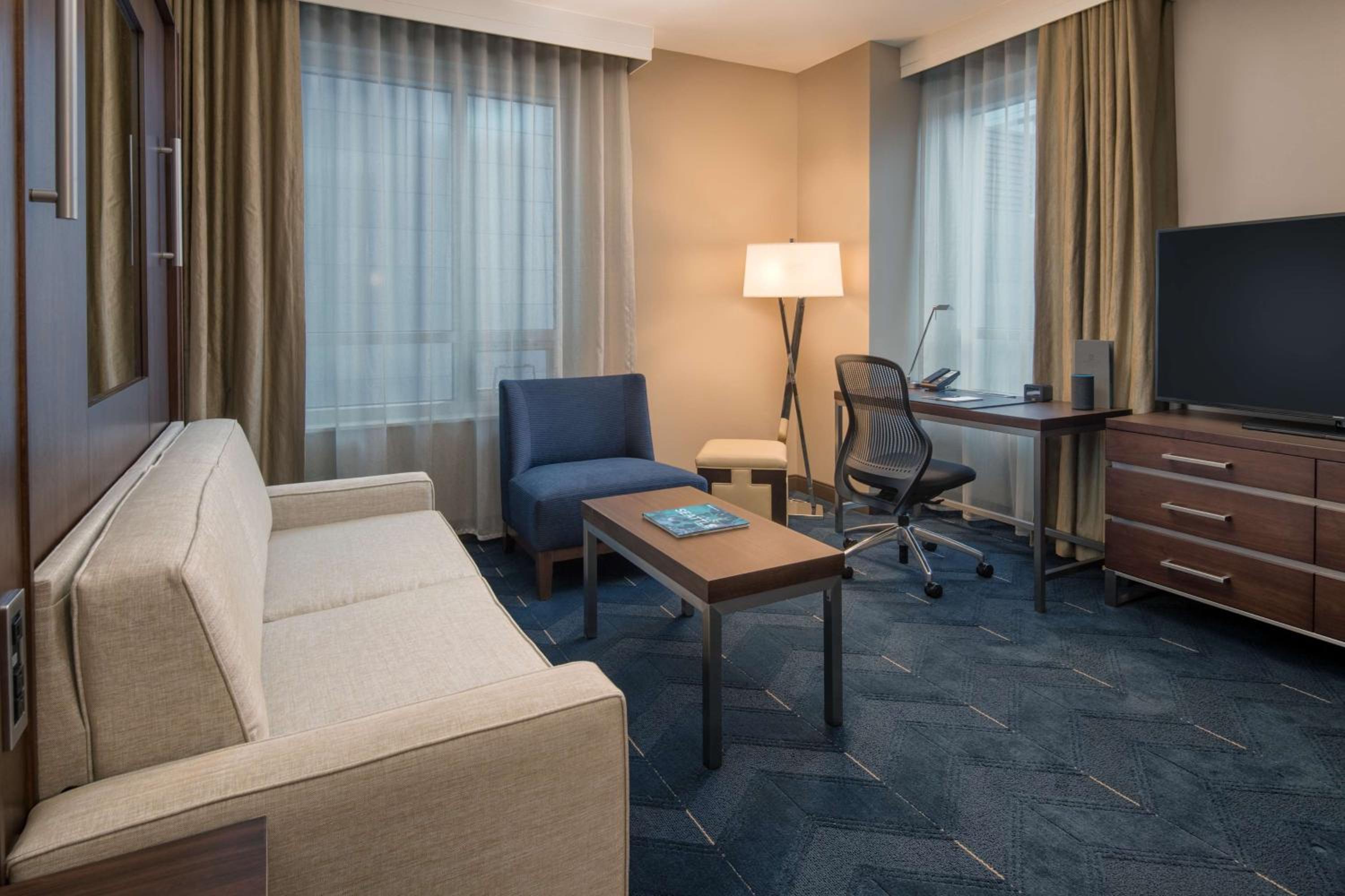 Urban Room with One Murphy Queen Bed