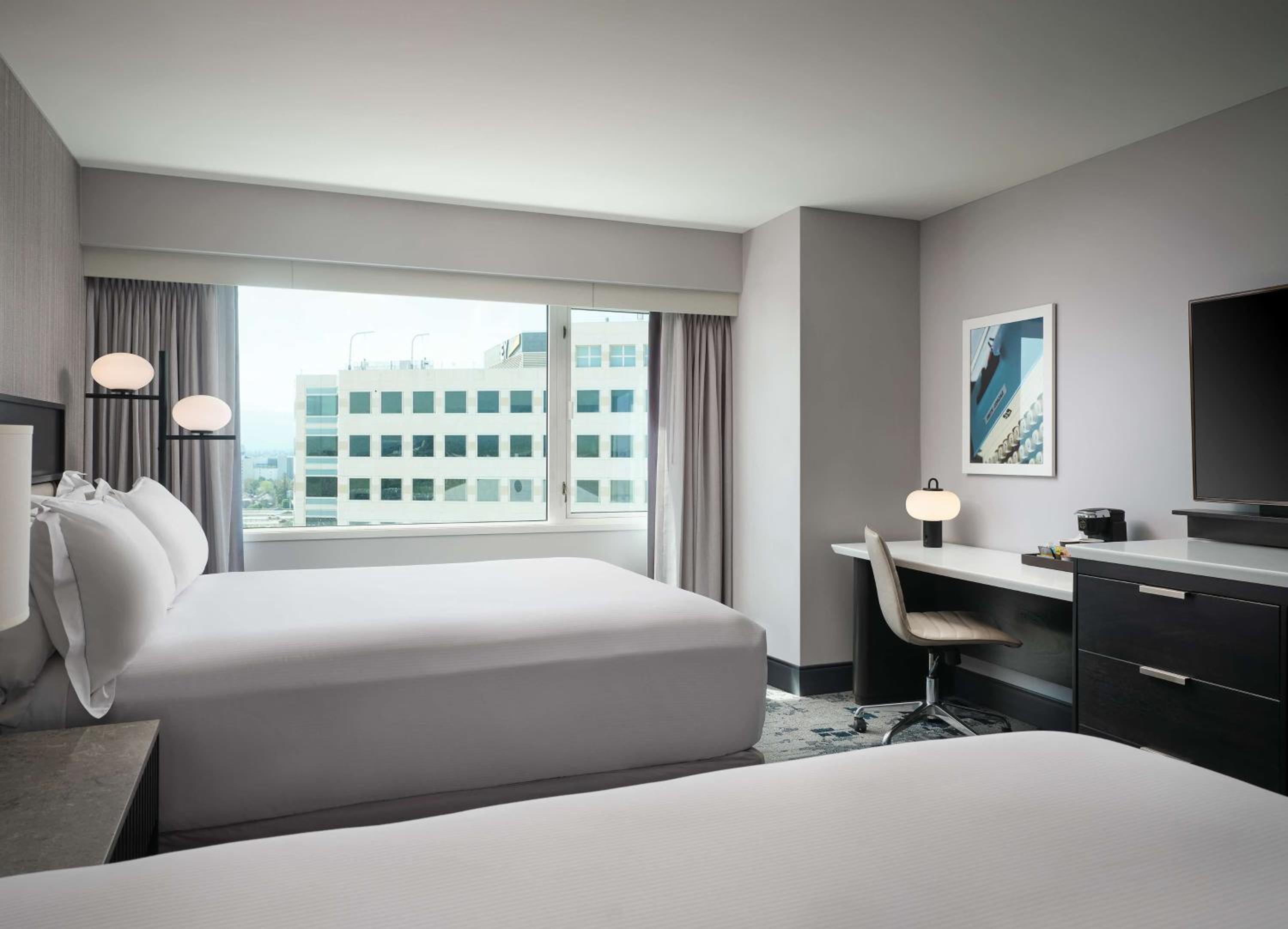 Queen Room with Two Queen Beds - Photo 2