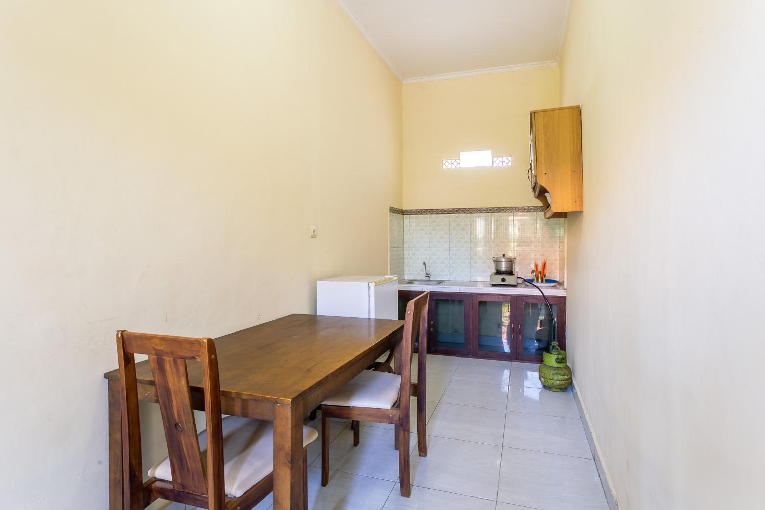 Deluxe Room with Kitchen - Photo 12