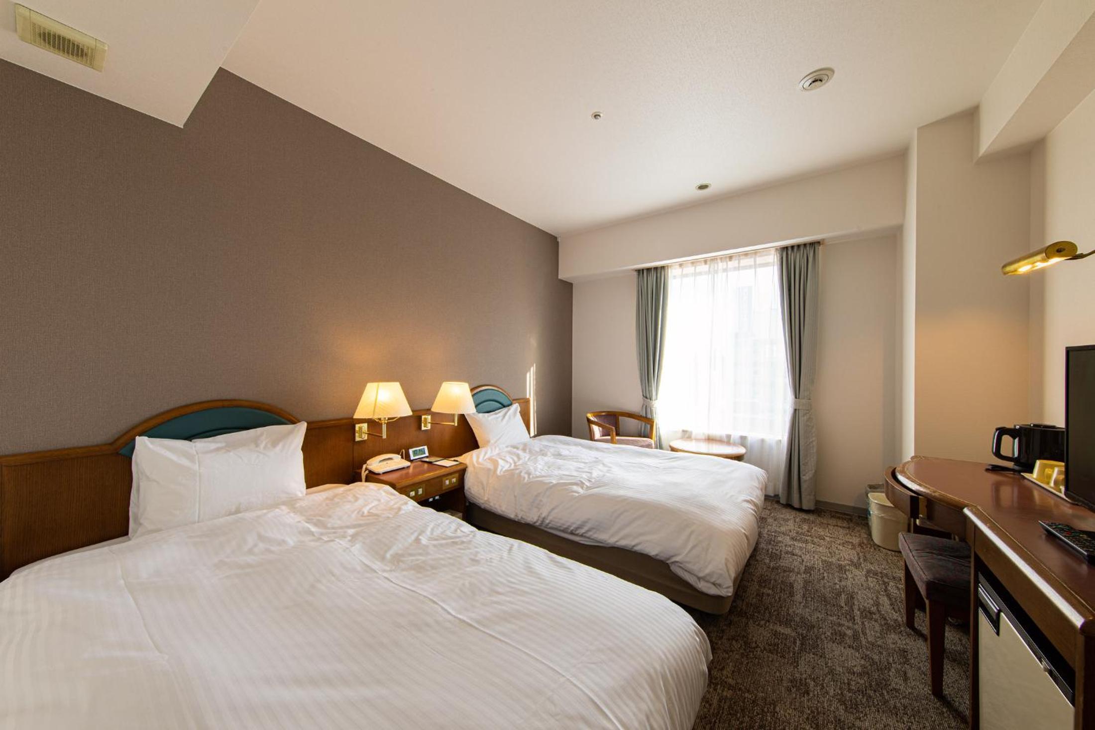 Twin Room - Non-Smoking - Photo 1