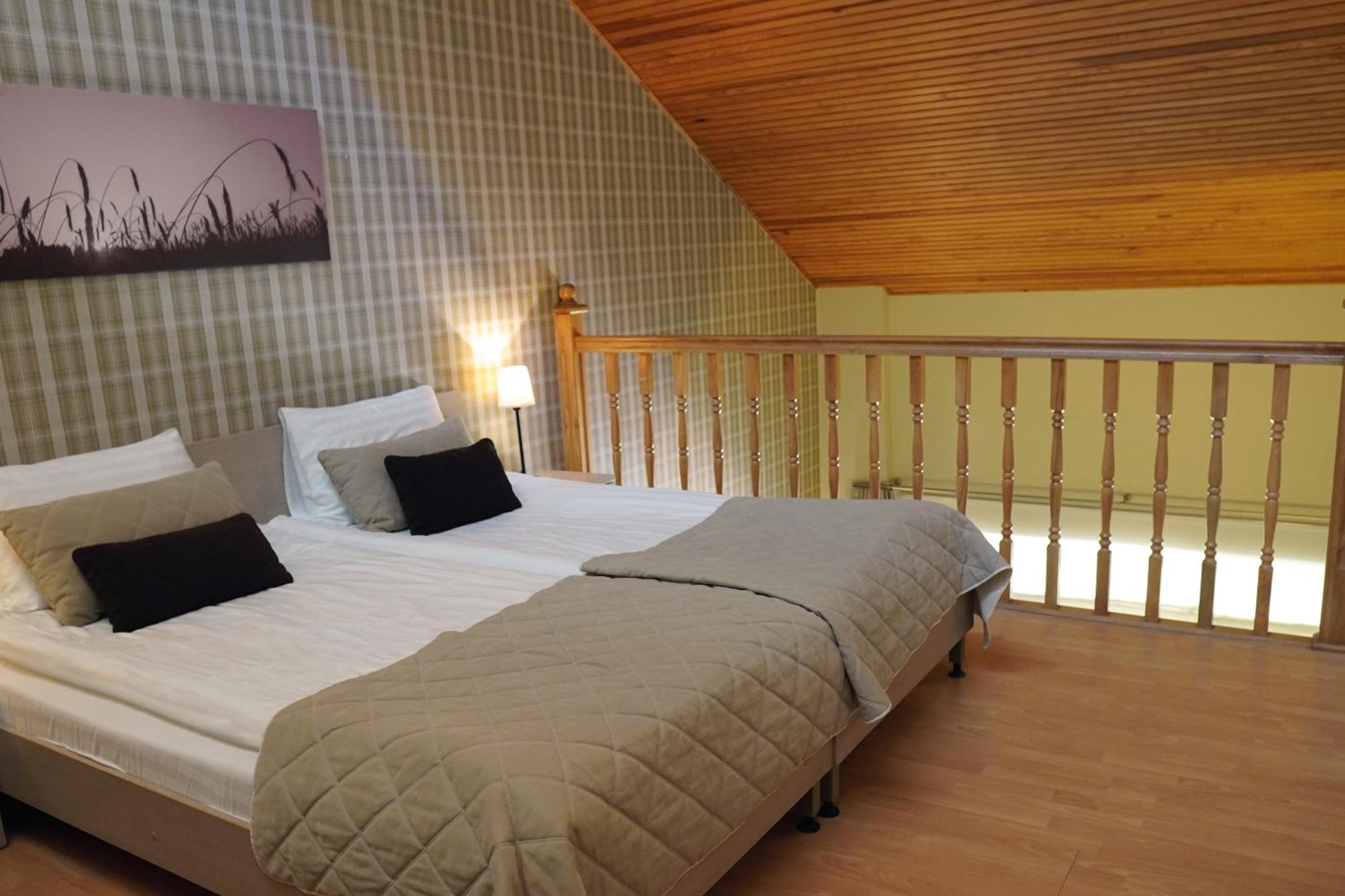 Two-story Deluxe Suite with a Balcony and Spa Access