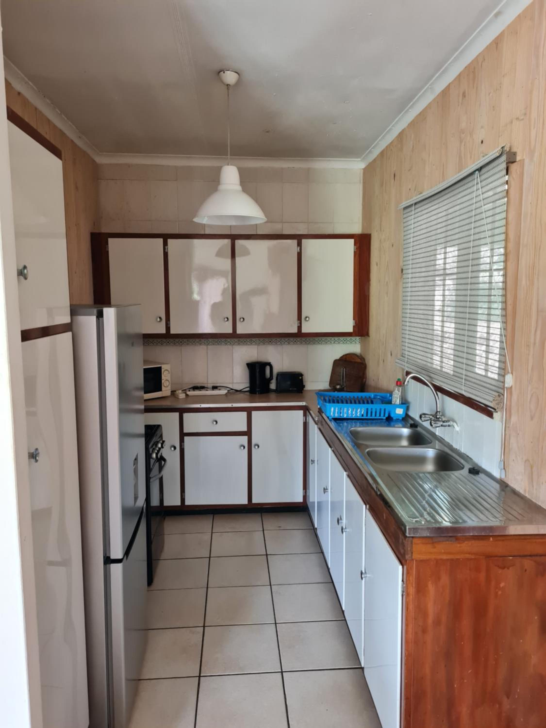 Three-Bedroom House - Photo 25