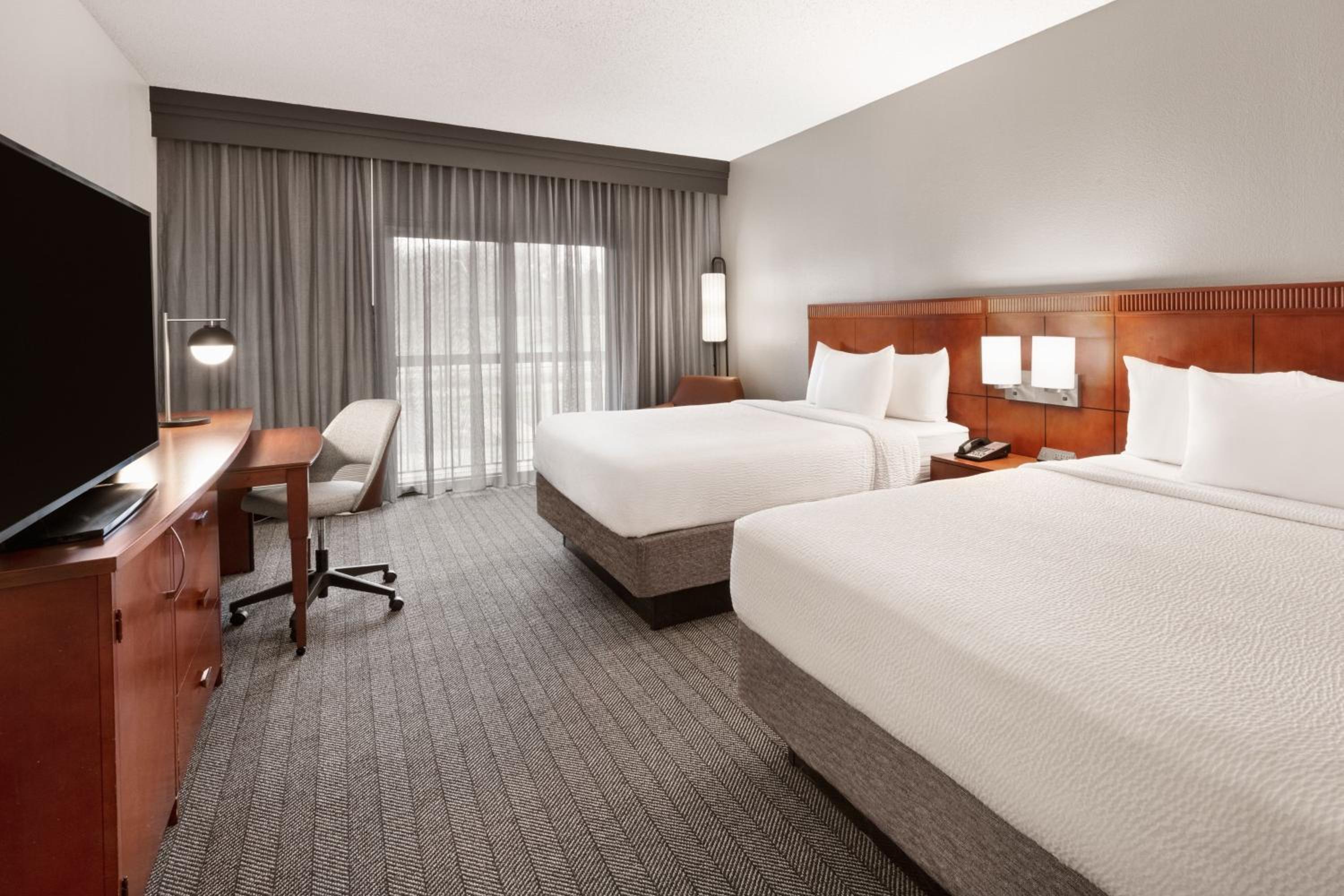 Queen Room with Two Queen Beds - Photo 1
