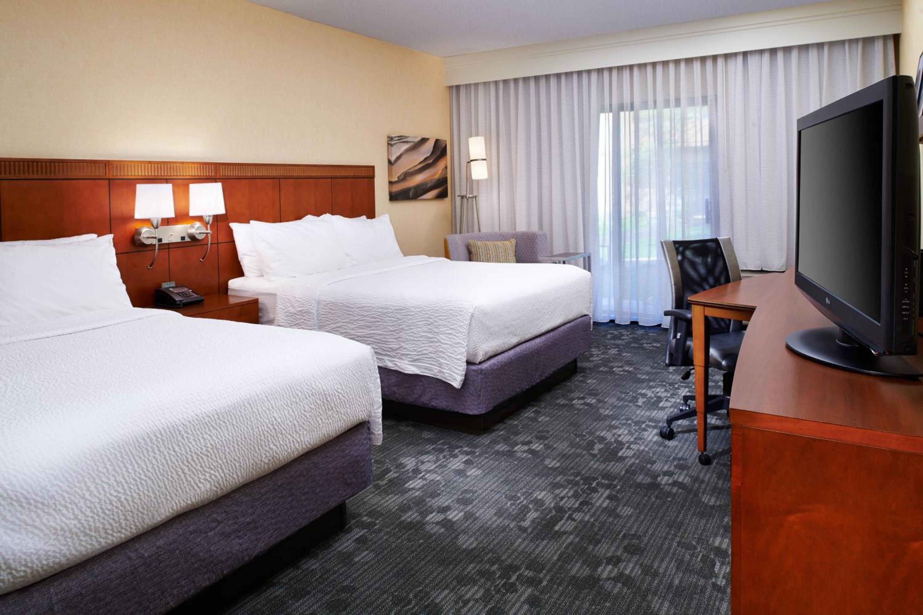 Queen Room with Two Queen Beds - Photo 1