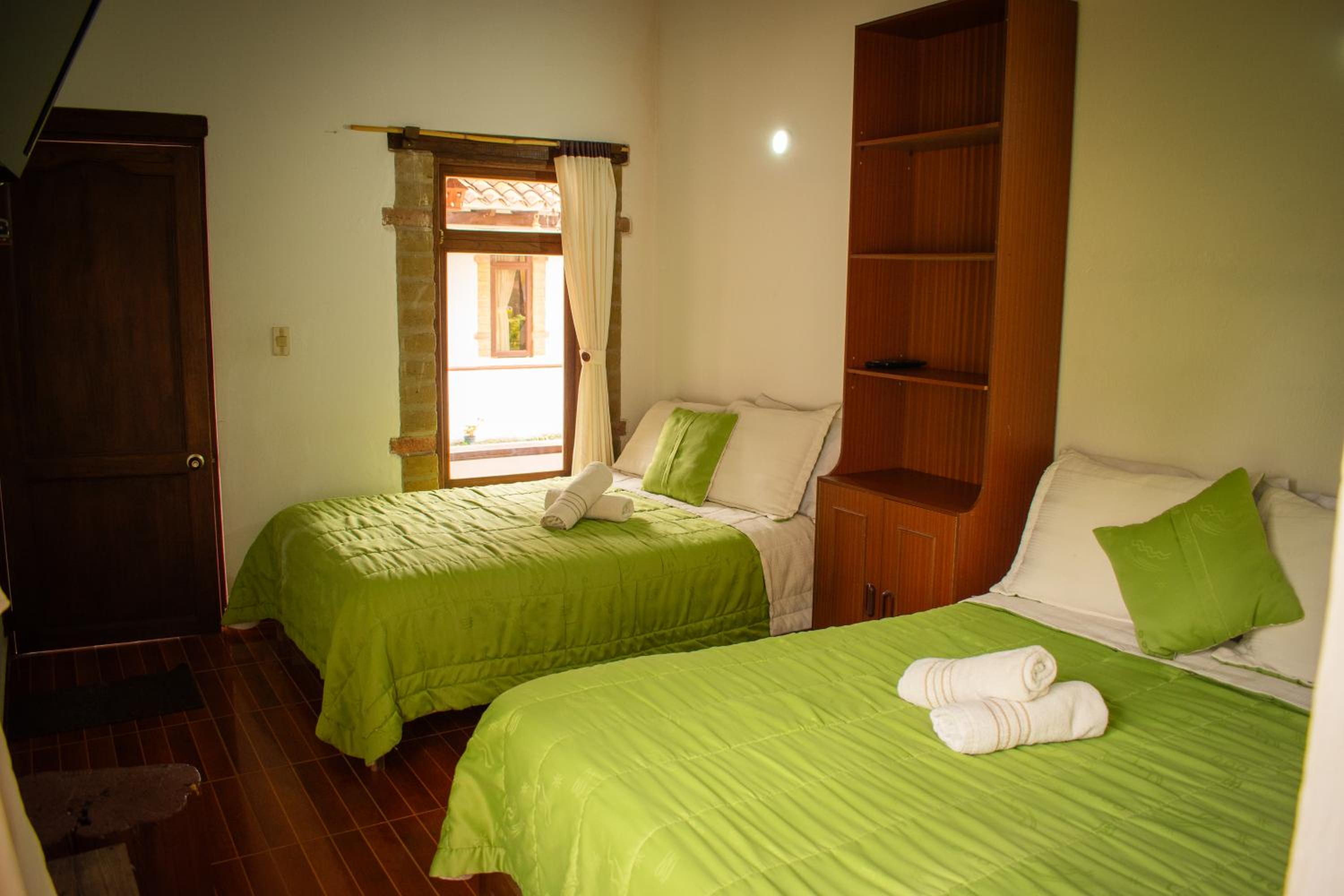 Quadruple Room with Private Bathroom photo 1