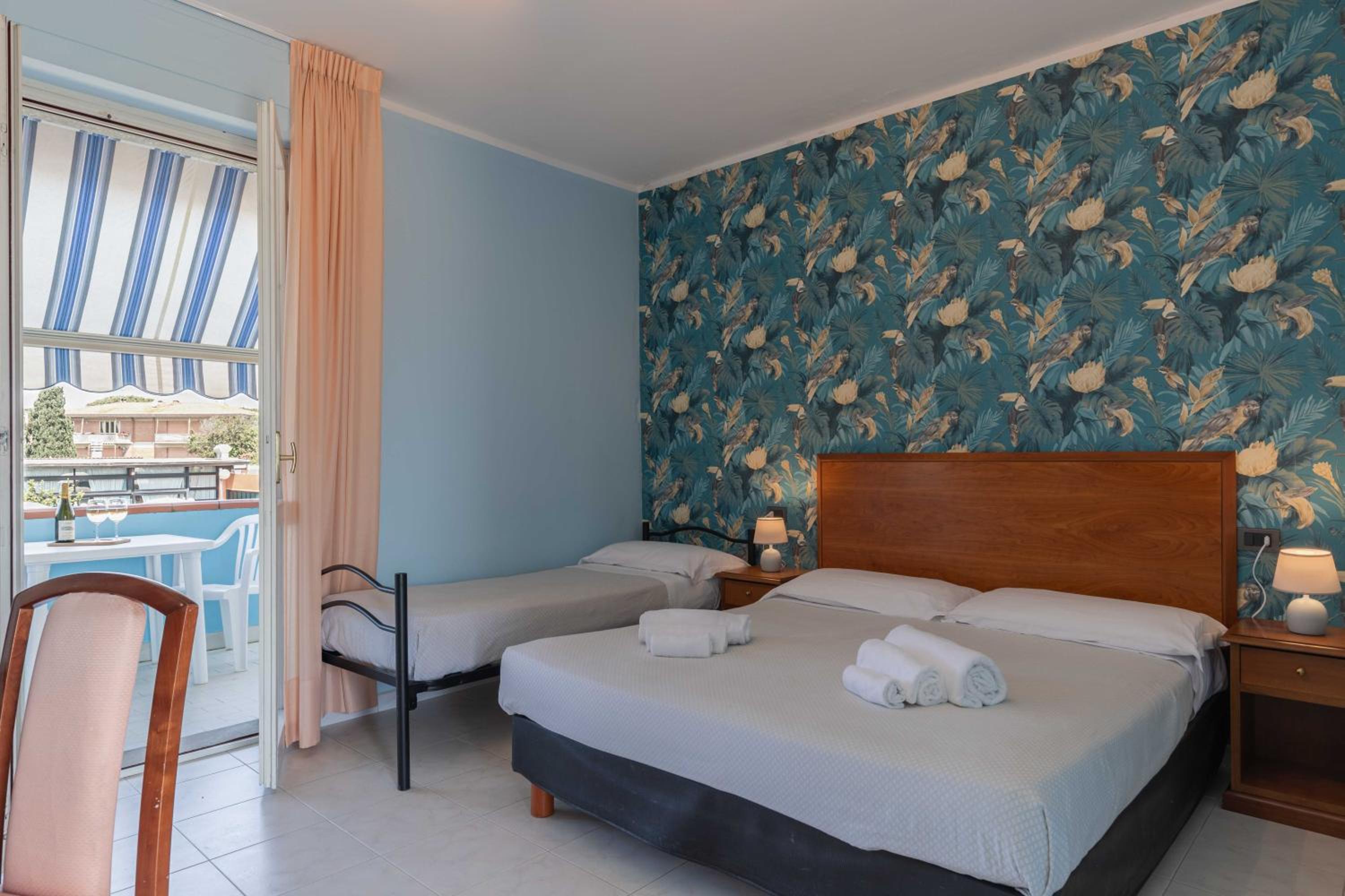 Double Room with Balcony (2 Adults + 1 Child) photo 1