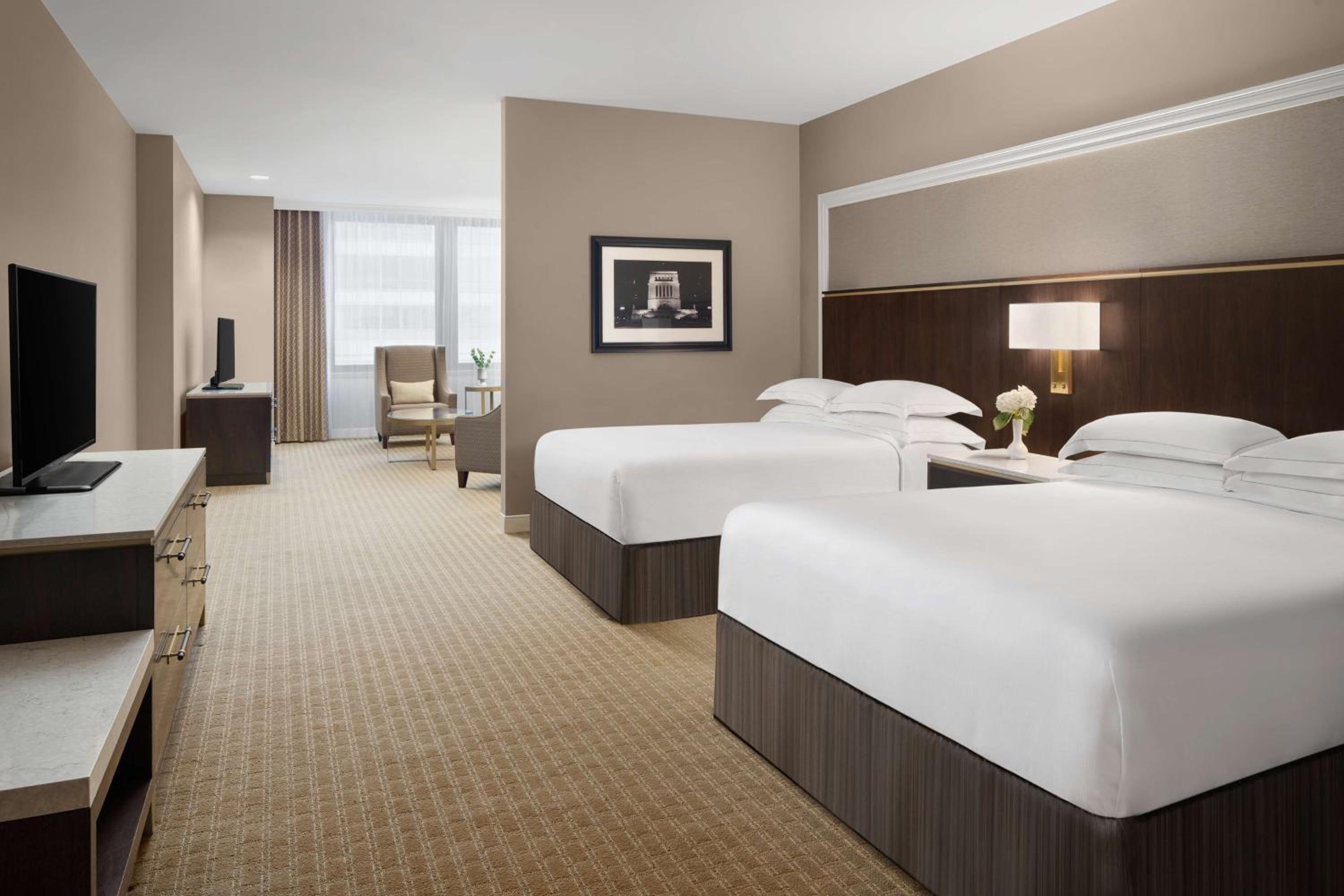 Deluxe Queen Room with Two Queen Beds and Sofa Bed - Photo 1