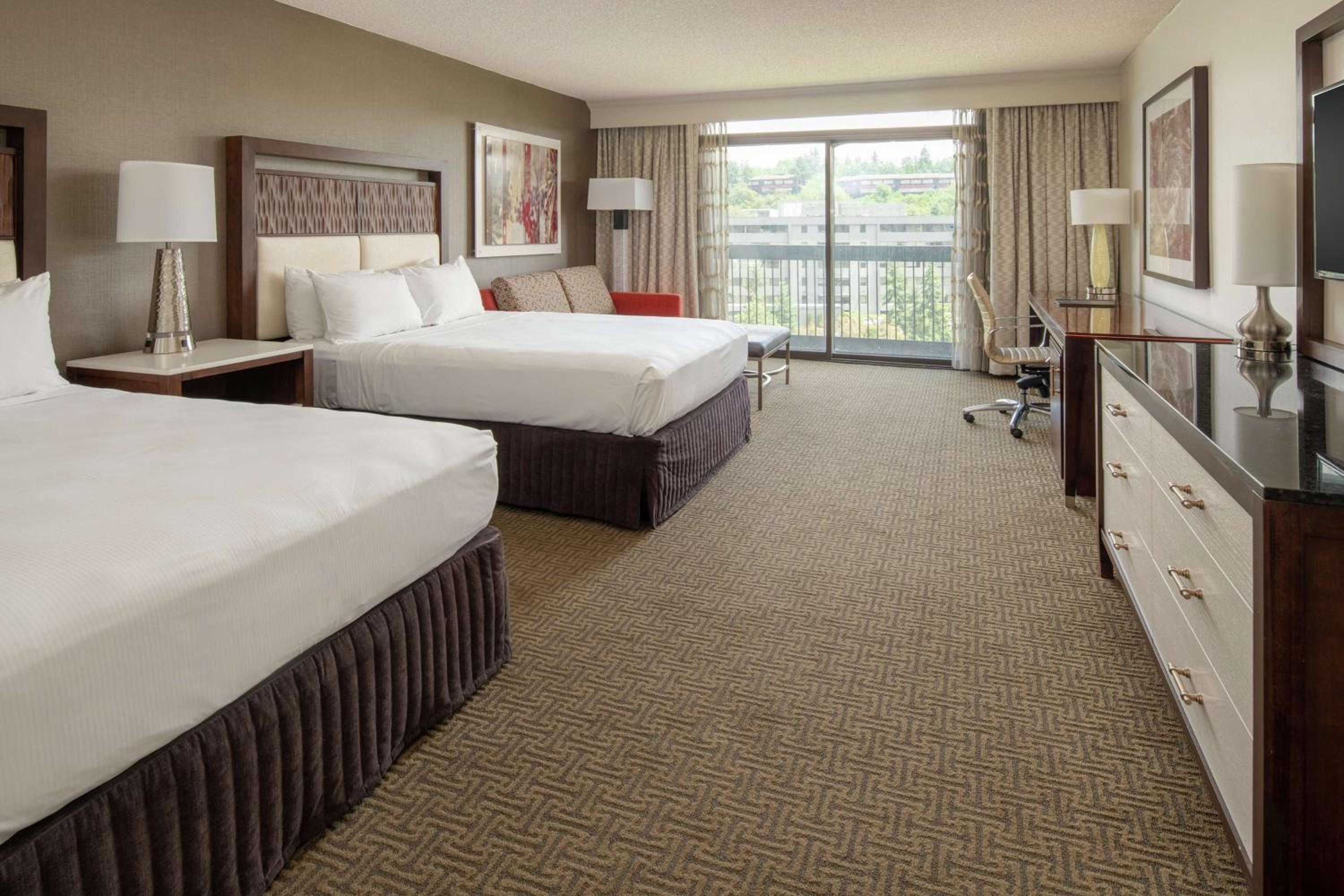 Queen Room with Two Queen Beds and Sofa Bed - Photo 2