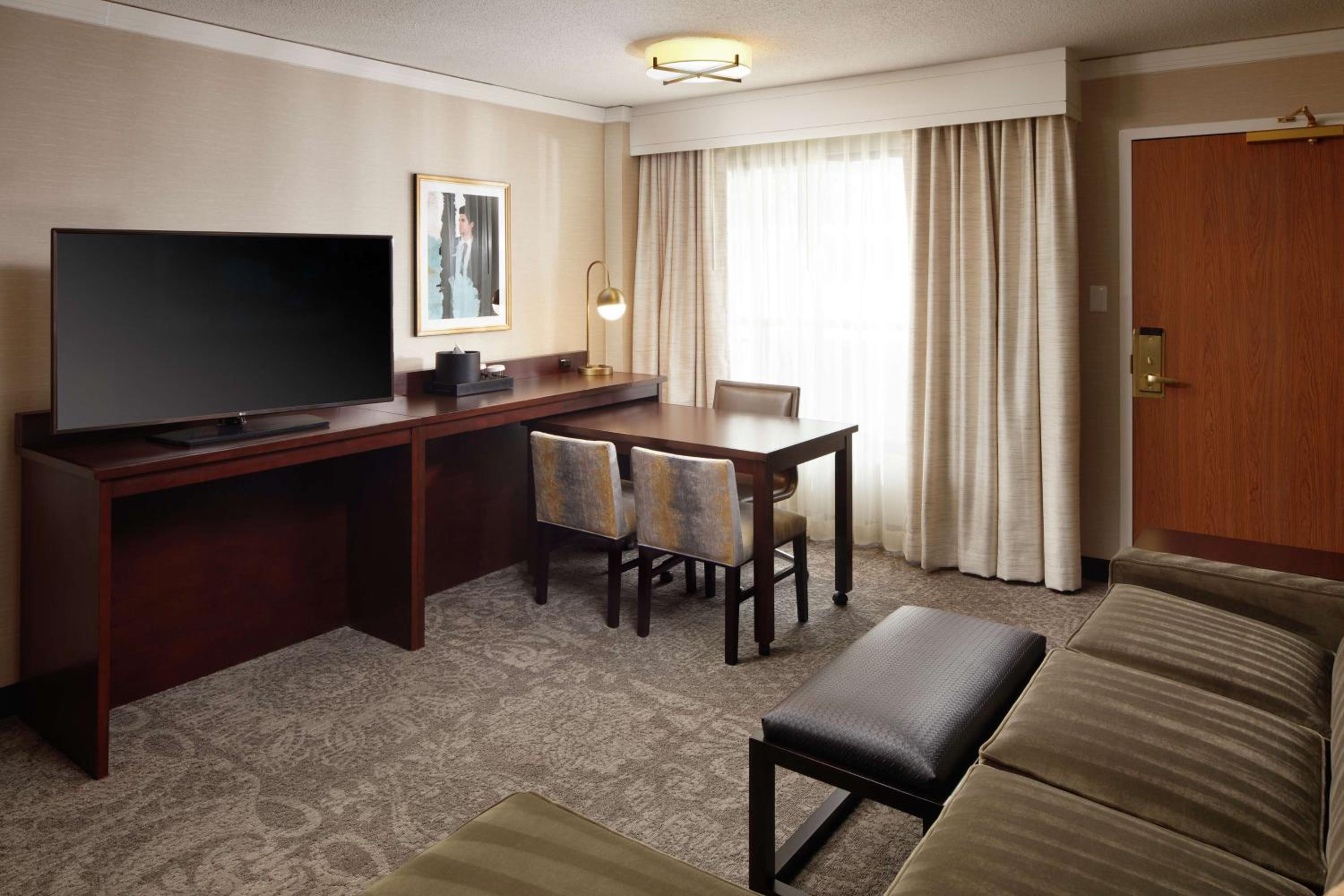 Suite with One King Bed, One Queen Sofa Bed and Shower - Photo 3