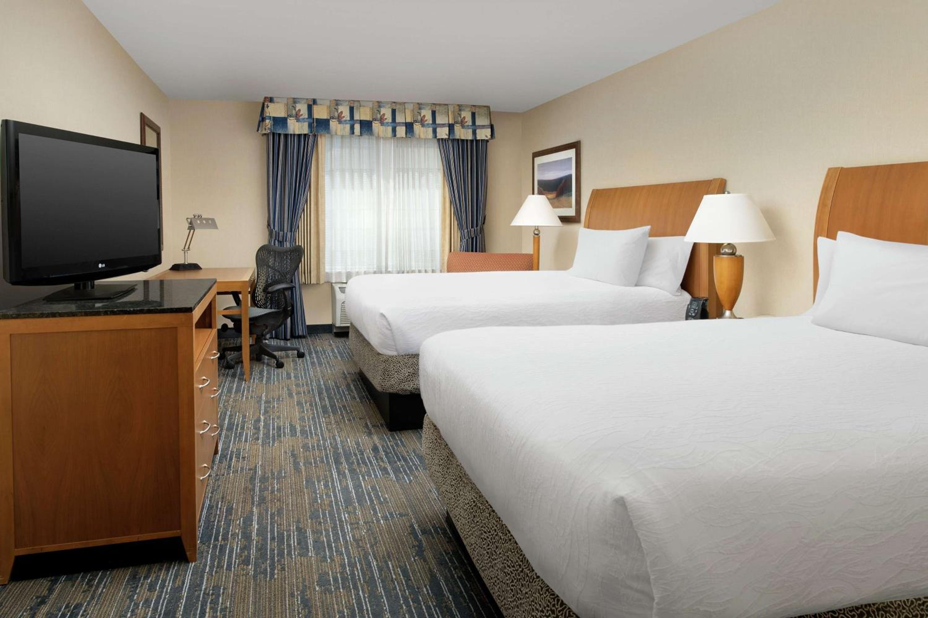 Queen Room with Two Queen Beds - Photo 1