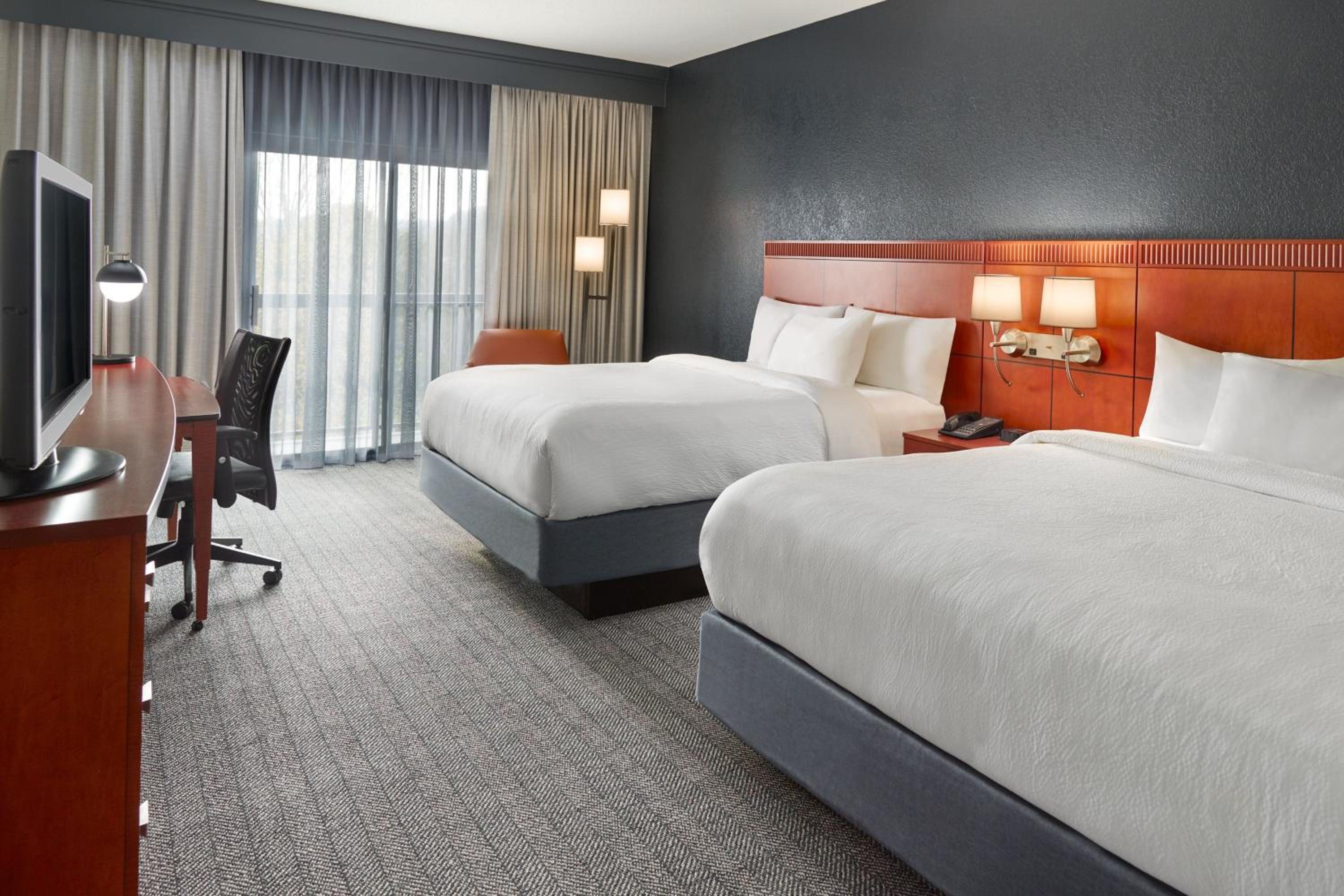 Queen Room with Two Queen Beds - Photo 1