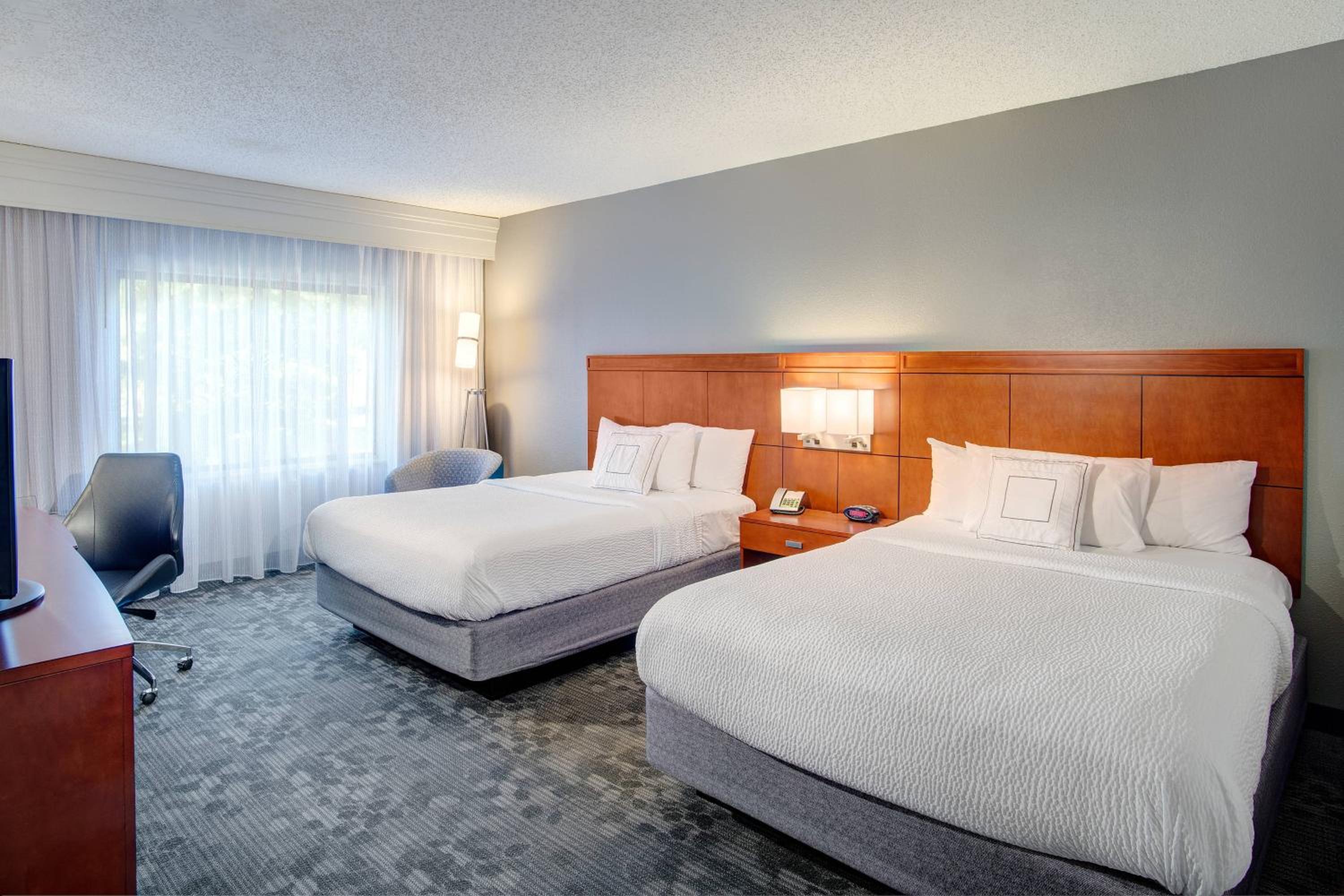 Queen Room with Two Queen Beds - Photo 1
