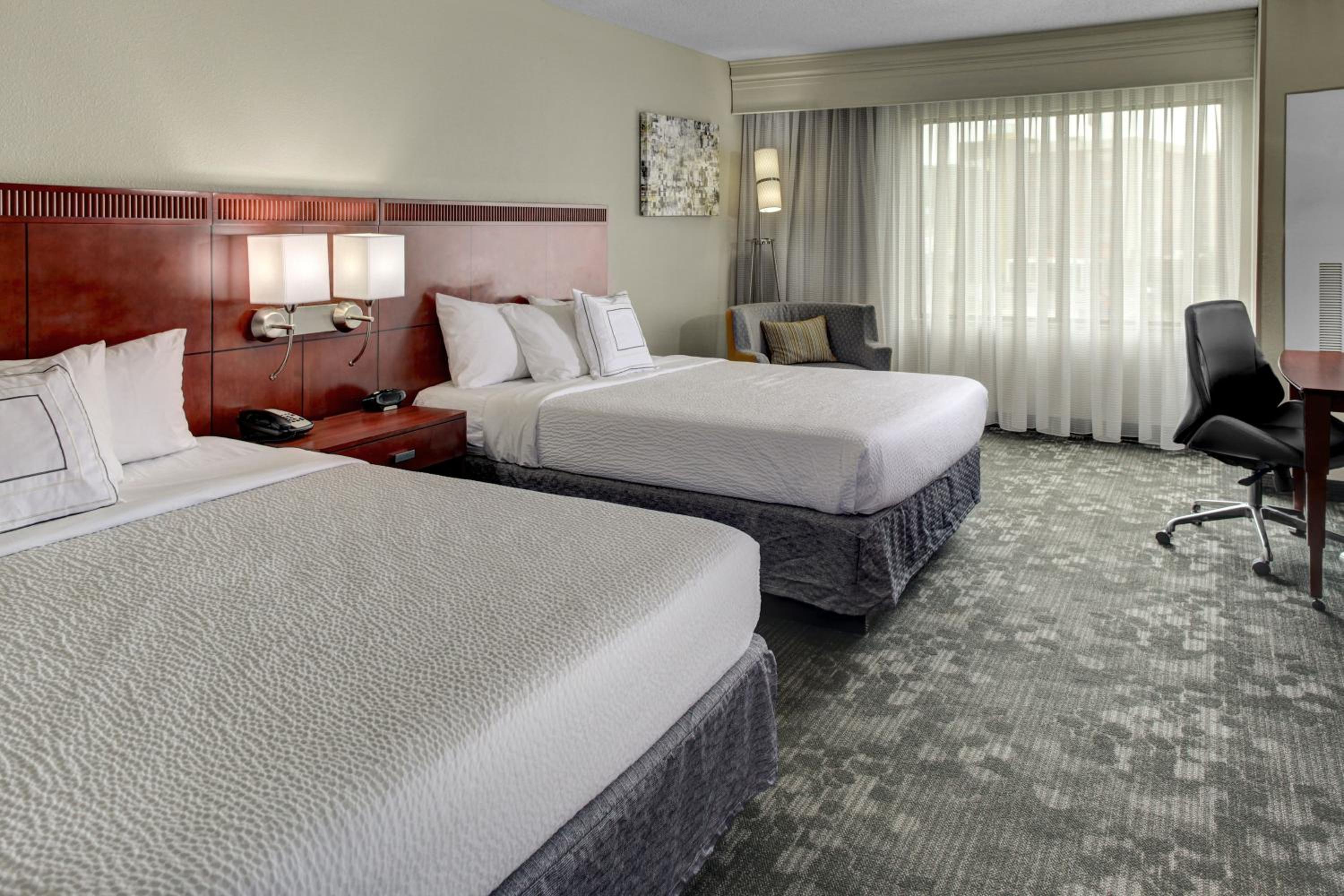 Queen Room with Two Queen Beds - Photo 1