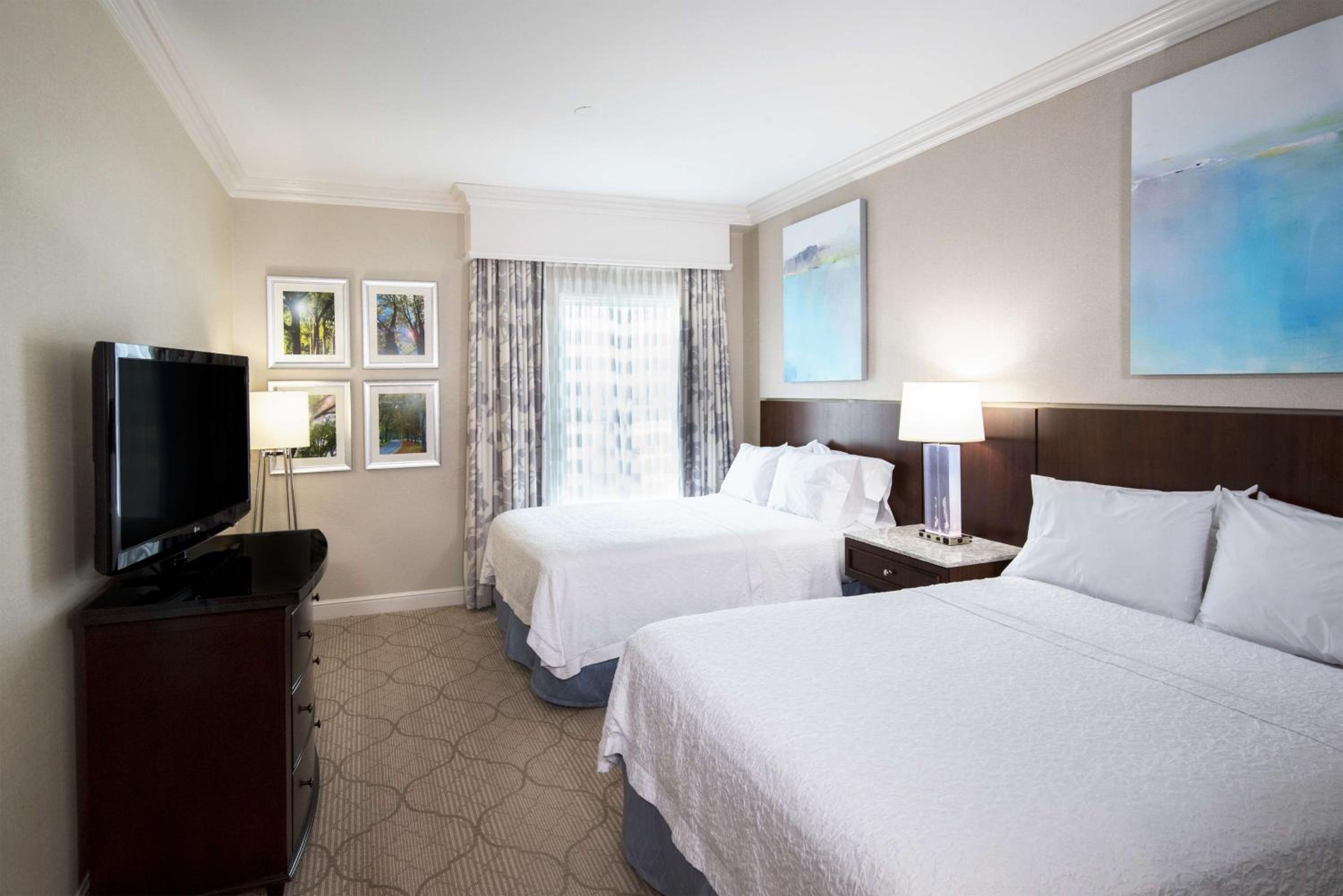 Queen Suite with Two Queen Beds and Sofa Bed - Photo 1