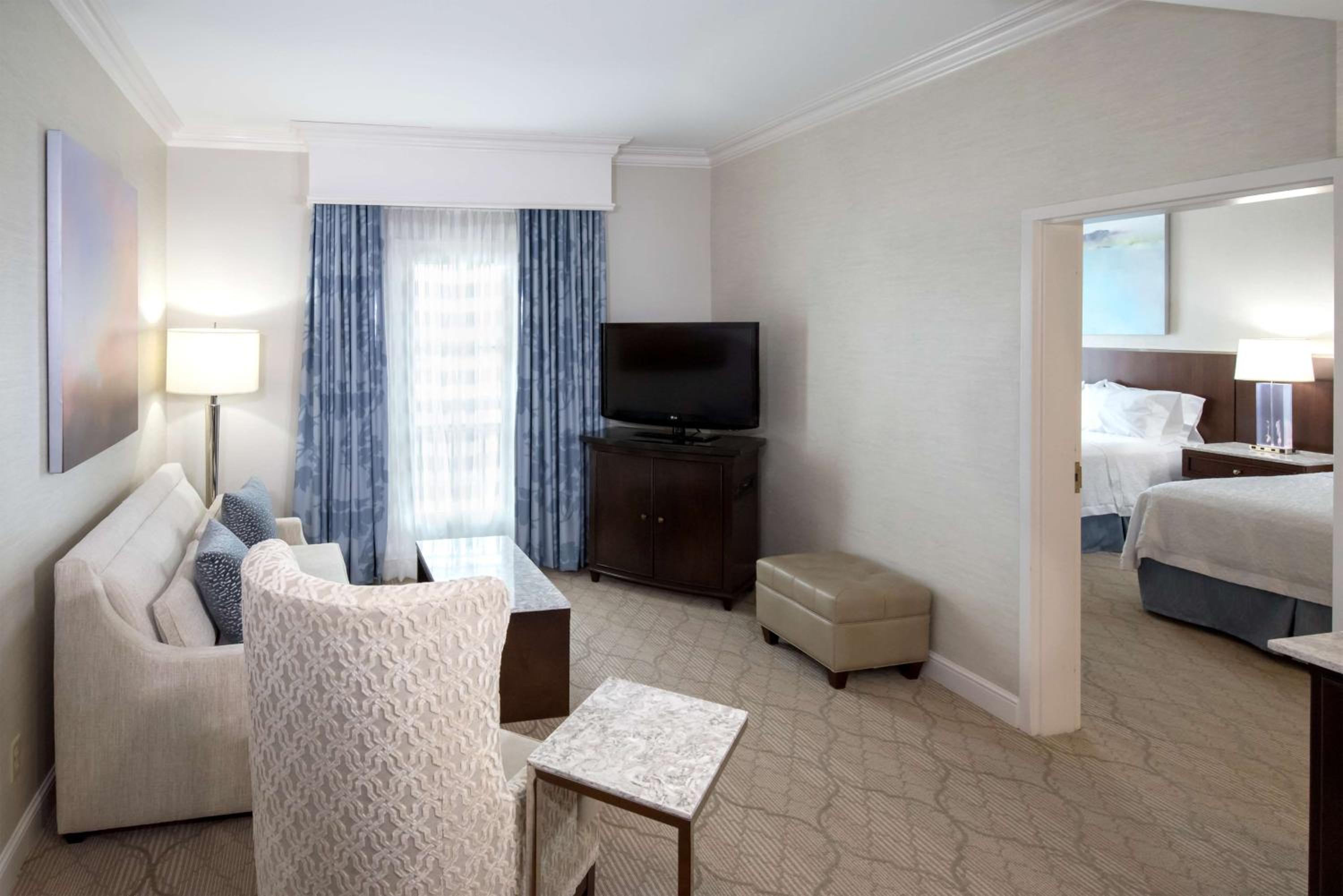 Queen Suite with Two Queen Beds and Sofa Bed - Photo 2