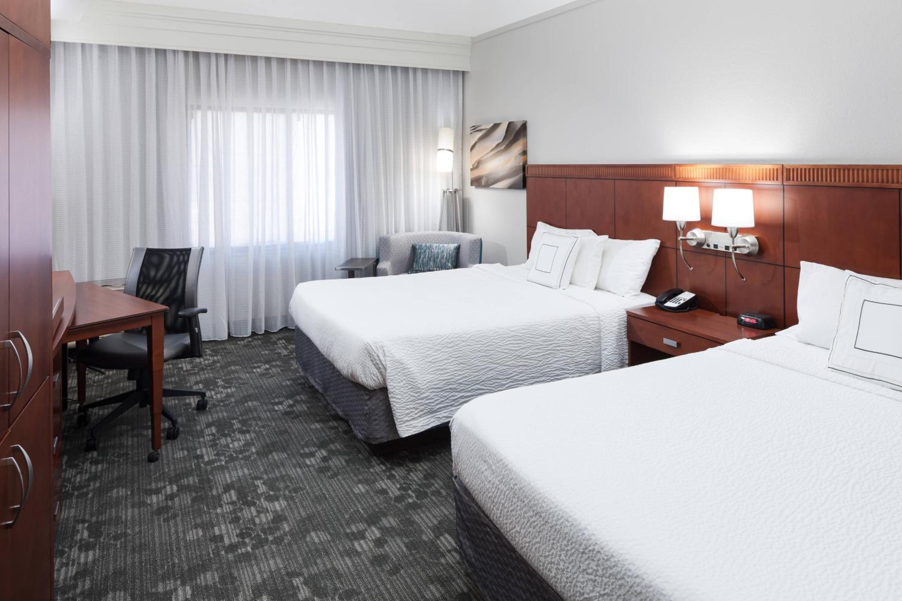 Queen Room with Two Queen Beds - Photo 1