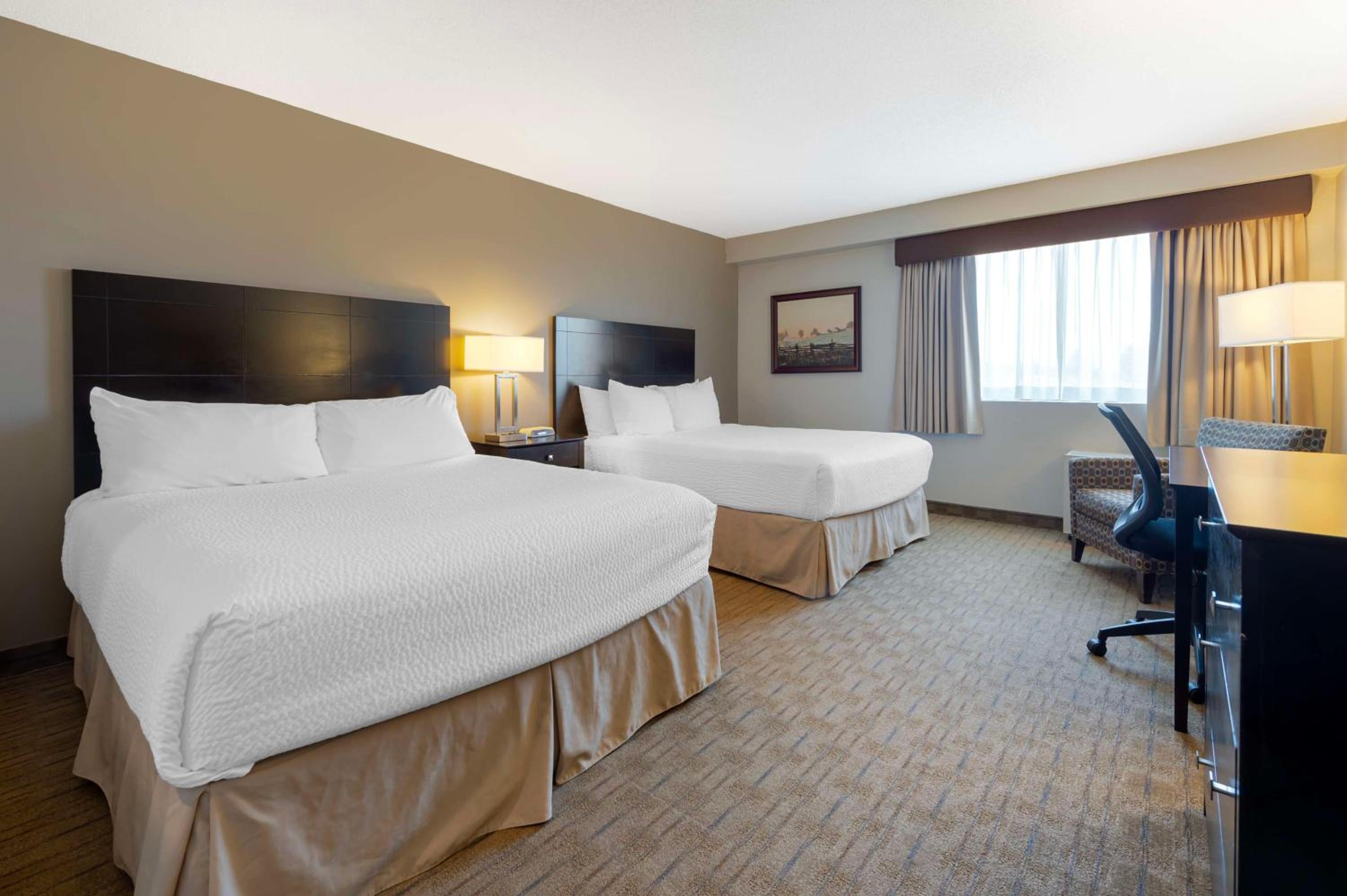 Queen Room with Two Queen Beds - Photo 1