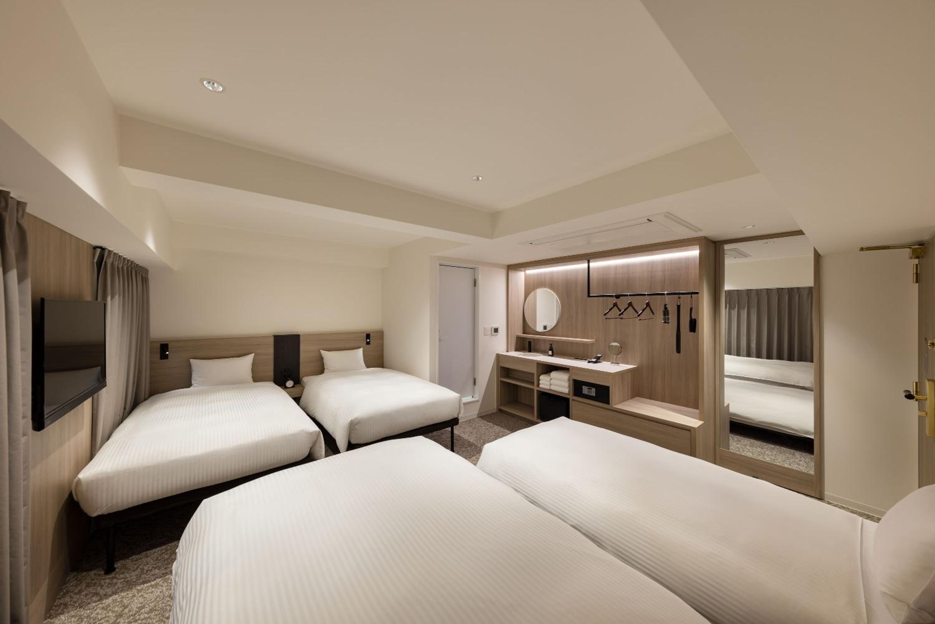 Family Room (3 Single Beds + 1 Sofa Bed)