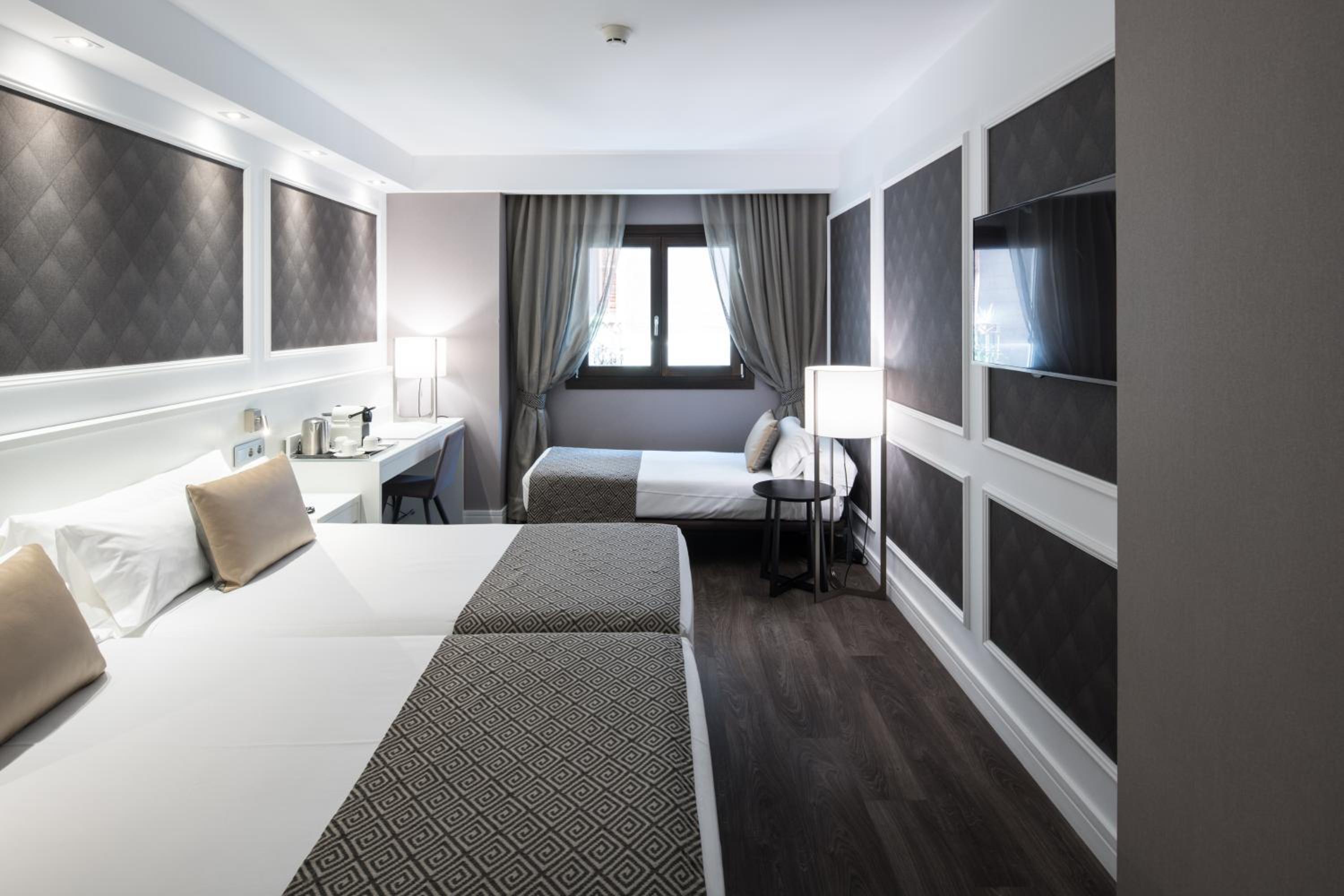 Triple Room (2 Adults + 1 Child)