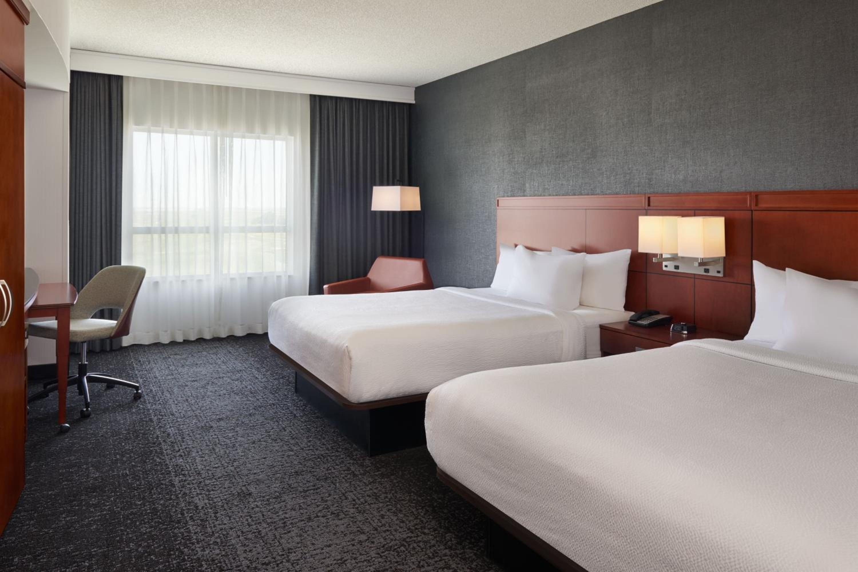 Queen Room with Two Queen Beds - Photo 1