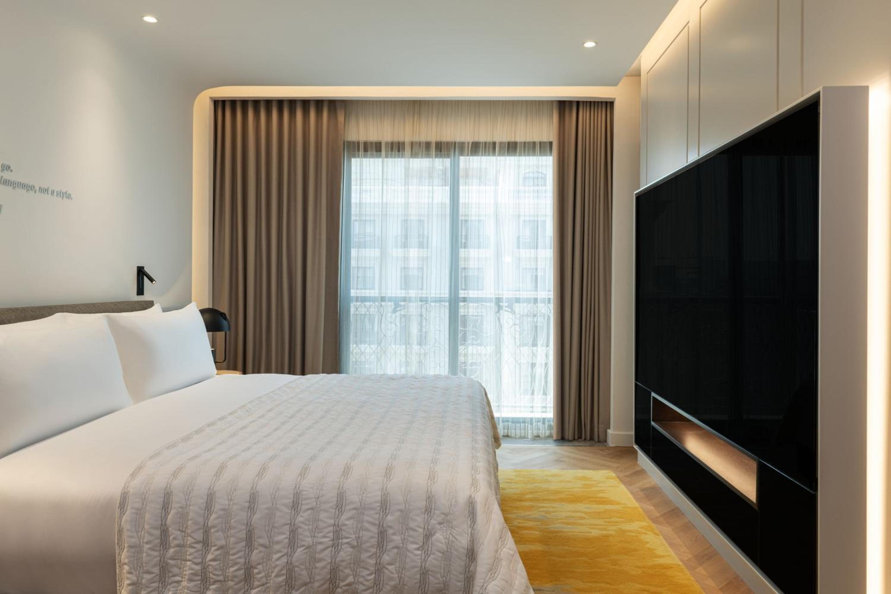 Deluxe One-Bedroom Apartment with Balcony - Photo 1