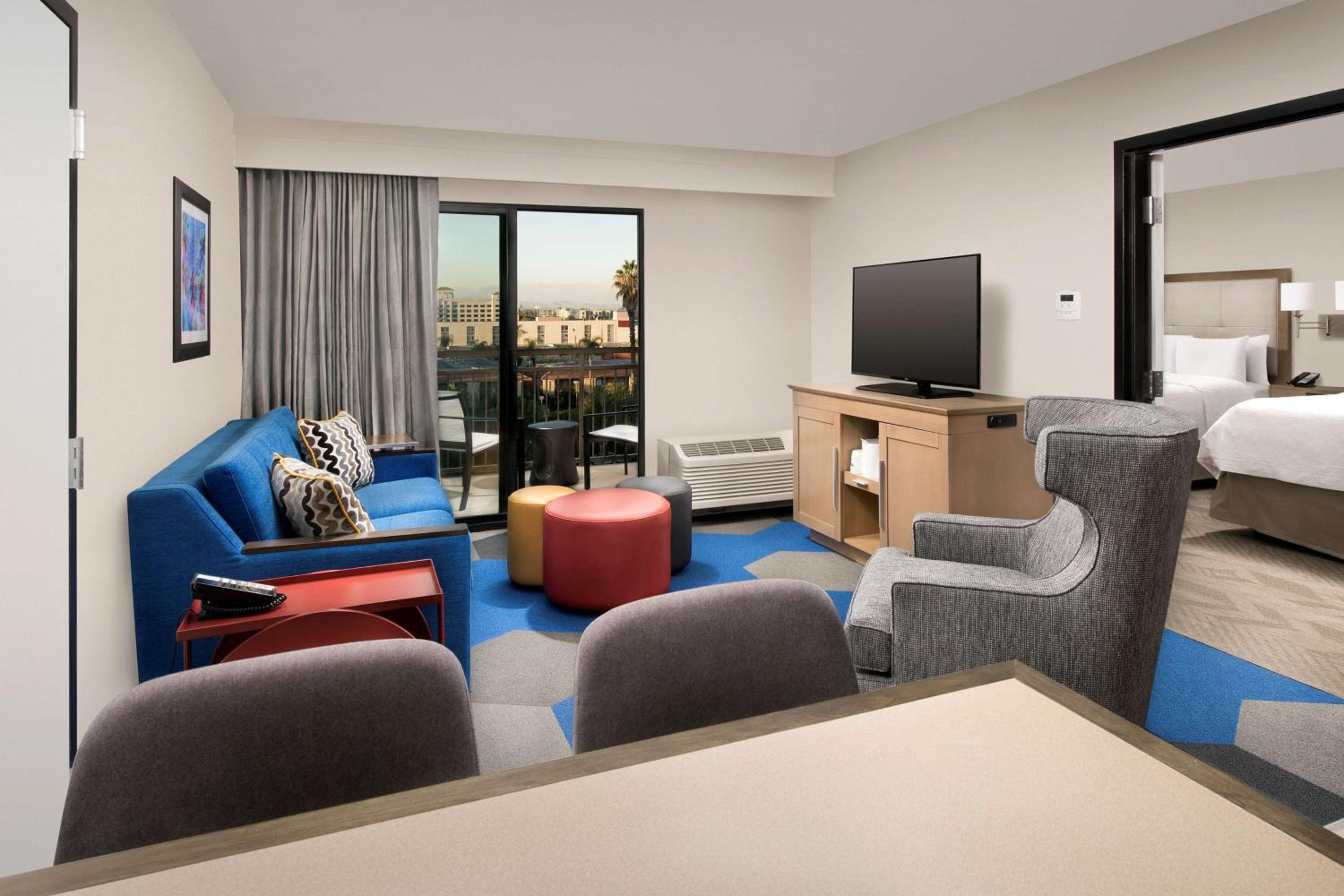 One-Bedroom Family Suite with Two Queen Beds and Balcony - Non-Smoking