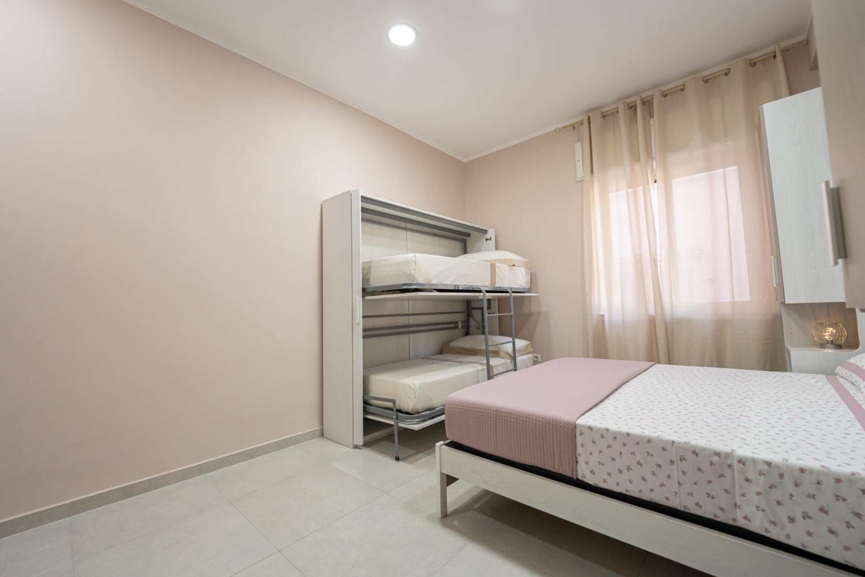 Quadruple Room with Private Bathroom