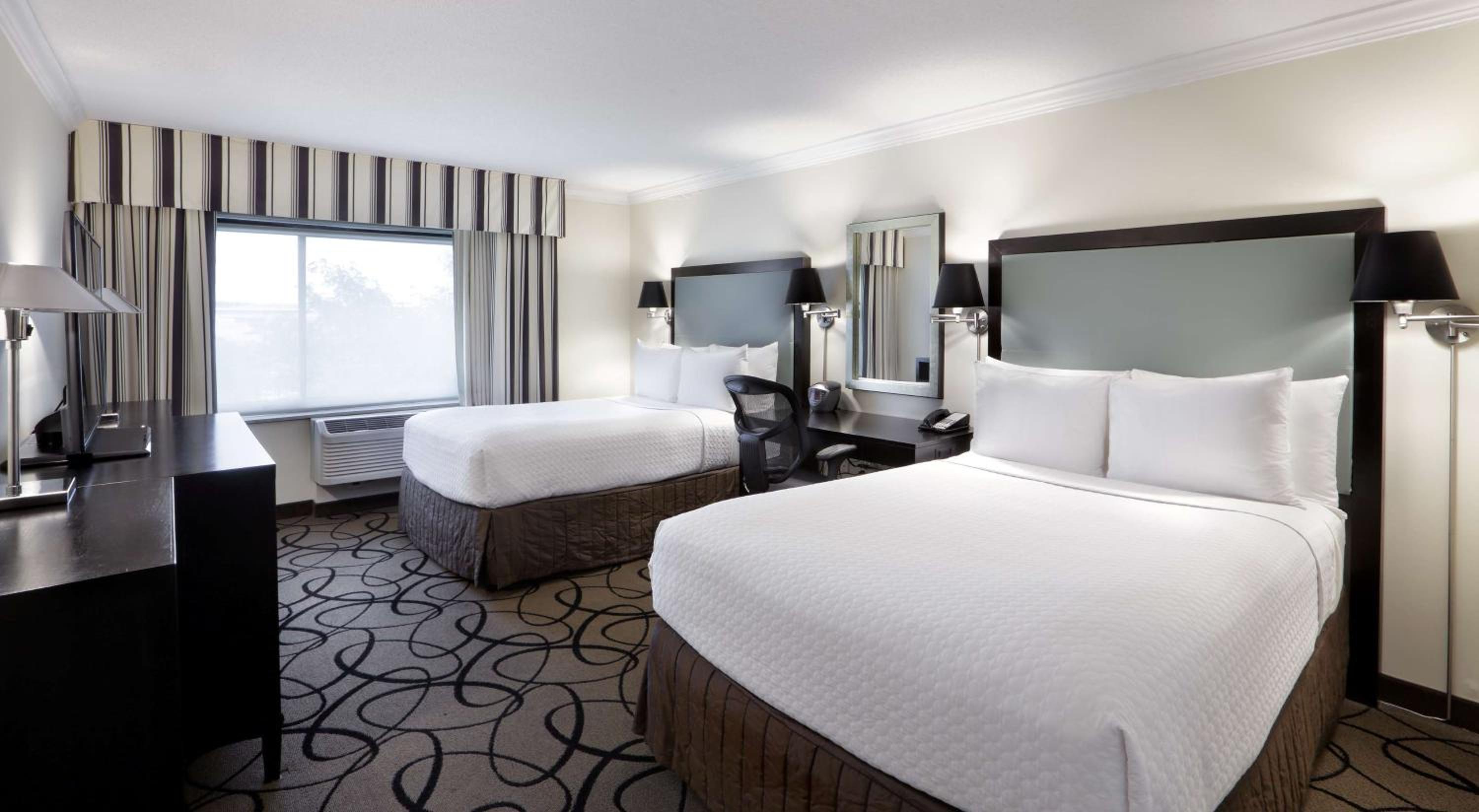 Comfort awaits in our cozy double queen guest room!