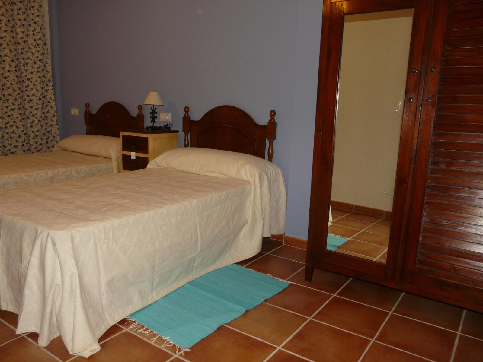 Habitación Deluxe Queen con Dos Camas Queen
